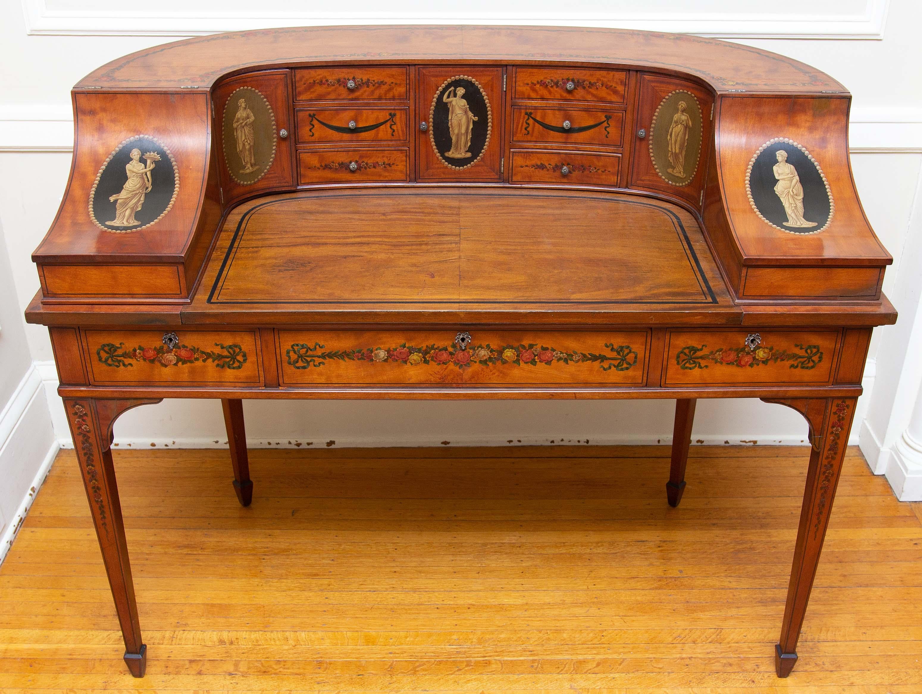 Presented by Joseph Dasta Antiques. Exceptional antique Edwardian hand painted Carlton house desk, circa 1900. Lots of storage. Finished on all sides.