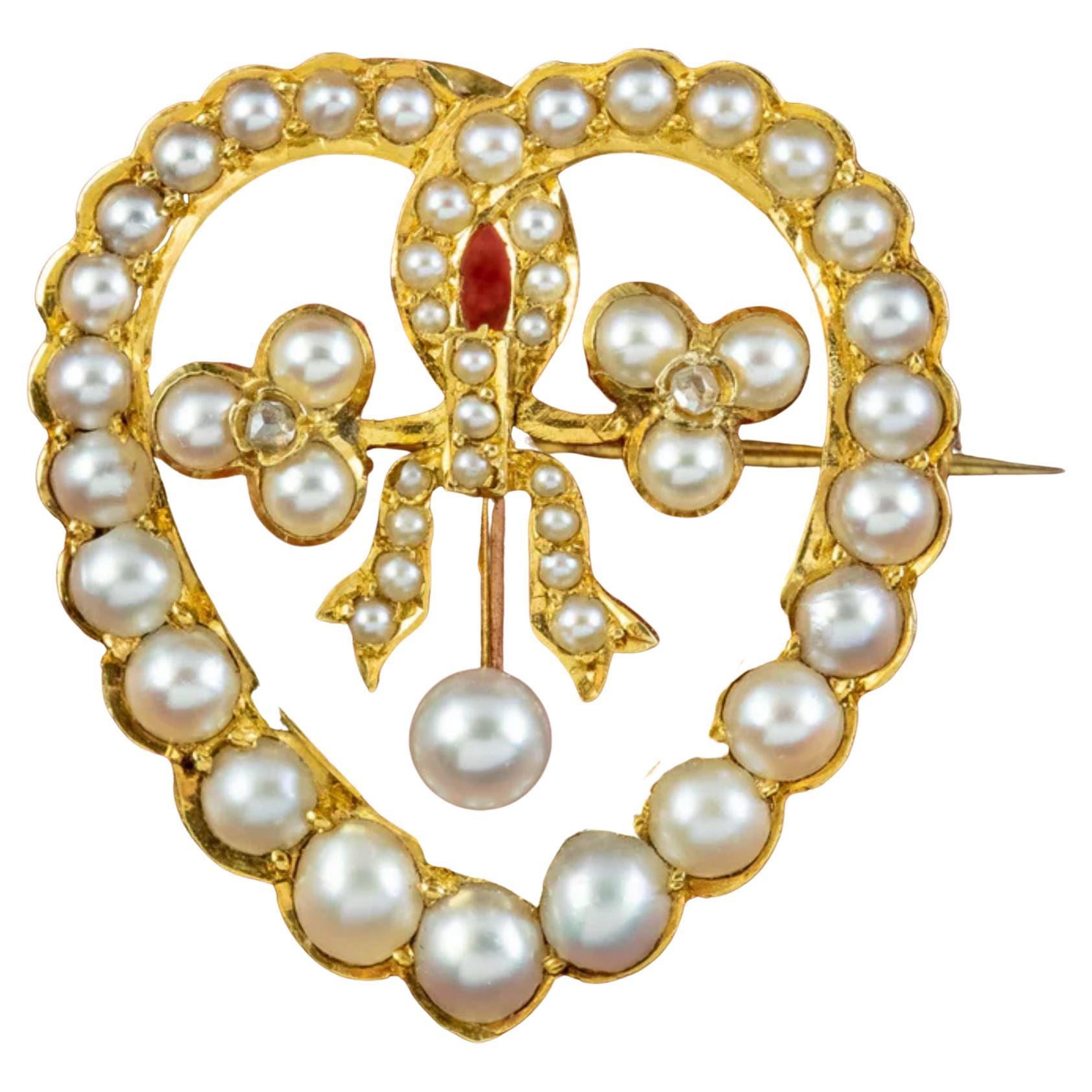 Antique Edwardian Pearl Diamond Heart Brooch in 15 Carat Gold, circa 1901 – 1915 For Sale