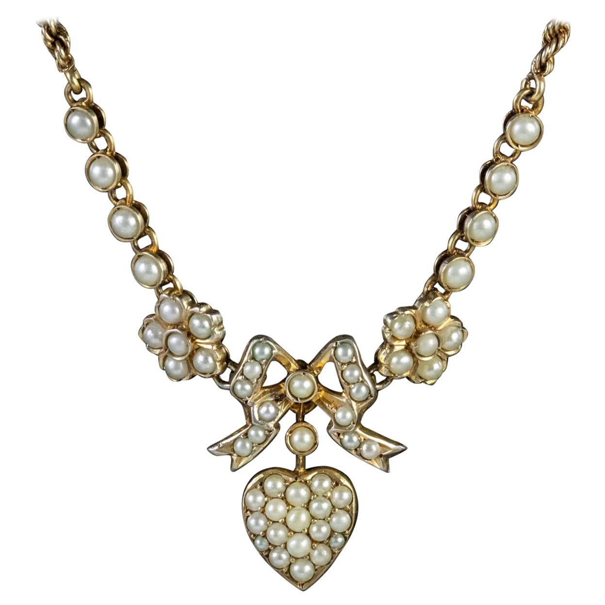 Antique Edwardian Pearl Heart Necklace Silver 15 Carat Gold, circa 1910 For Sale