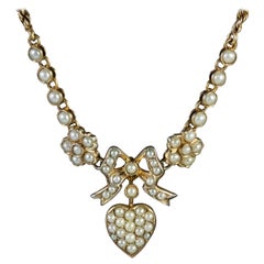 Antique Edwardian Pearl Heart Necklace Silver 15 Carat Gold, circa 1910