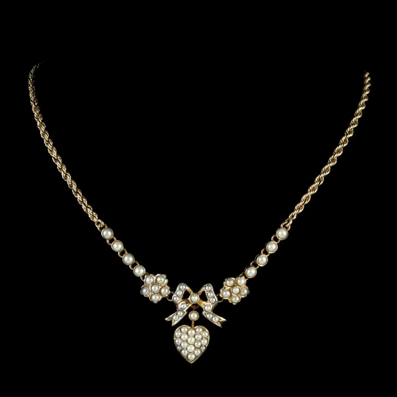 Women's Antique Edwardian Pearl Heart Necklace Silver 15 Carat Gold, circa 1910 For Sale