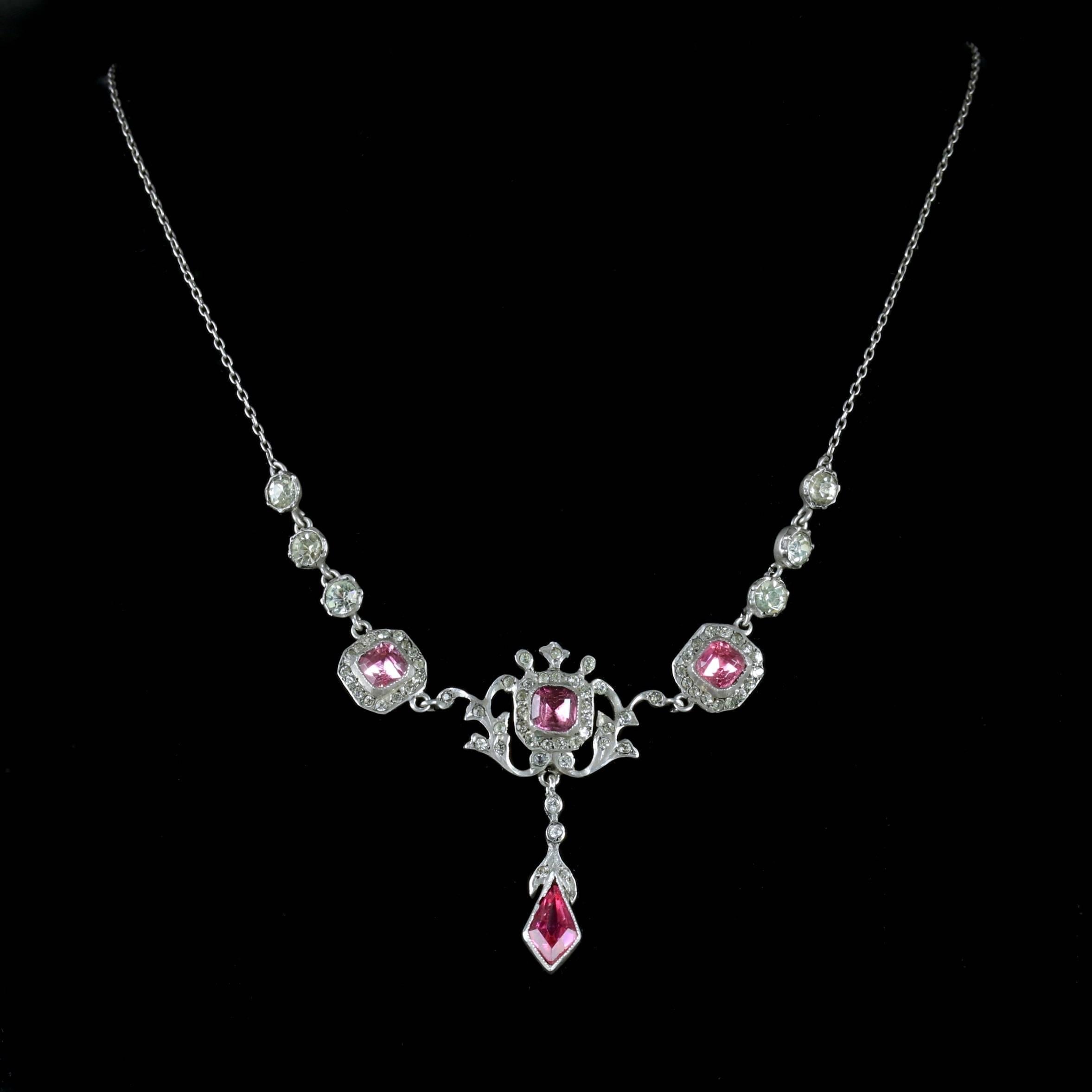 This spectacular Silver Edwardian pink and white Paste collar necklace is Circa 1905.

The combination of the pink and white Pastes looks superb on this necklace, the Paste stones sparkle beautifully in the light.

Paste is a heavy, transparent