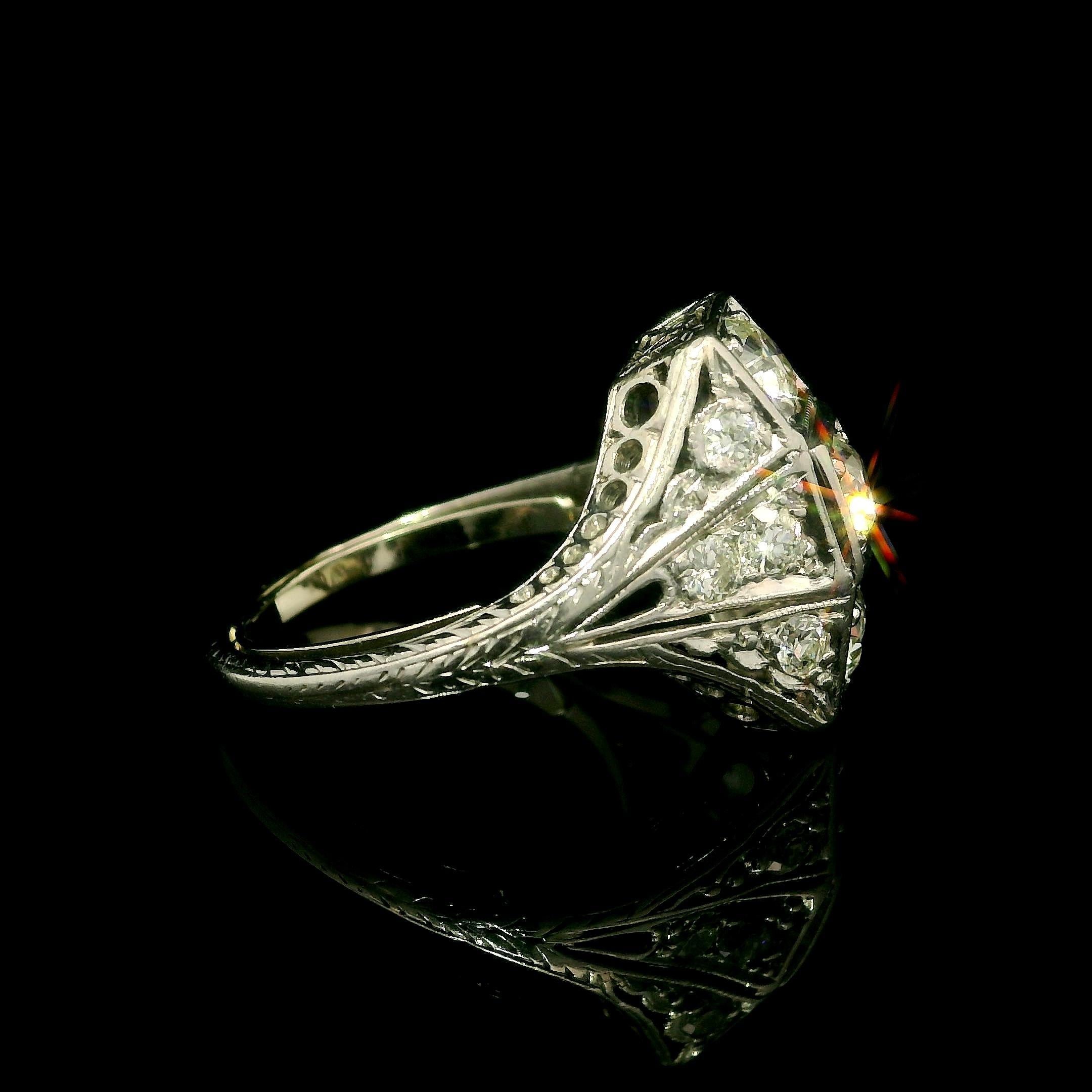 --Stone(s):--
(3) Natural Genuine Diamond - Old European Cut - Pave Set - Nice Brilliant White Color - 0.60ctw (approx.)
(8) Natural Genuine Diamonds - Old European & Old Single Cut - Pave Set - Nice Brilliant White Color - 0.16ctw (approx.)
Total
