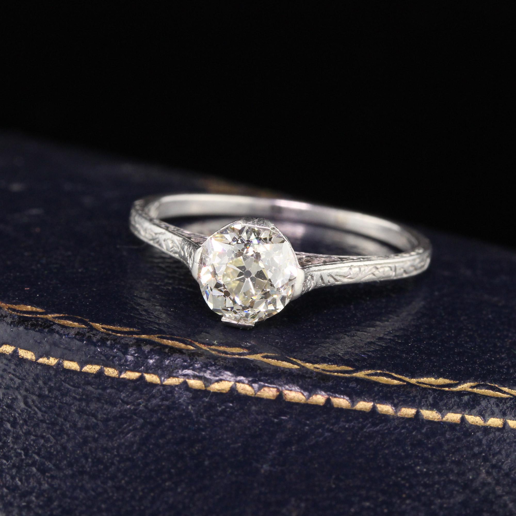 Magnificent Edwardian solitaire engagement ring in platinum featuring a 1.17 ct old european cut center diamond. Beautiful engraving and filigree work on the sides. This ring is in excellent condition.

#R0289

Metal: Platinum

Weight: 3.1