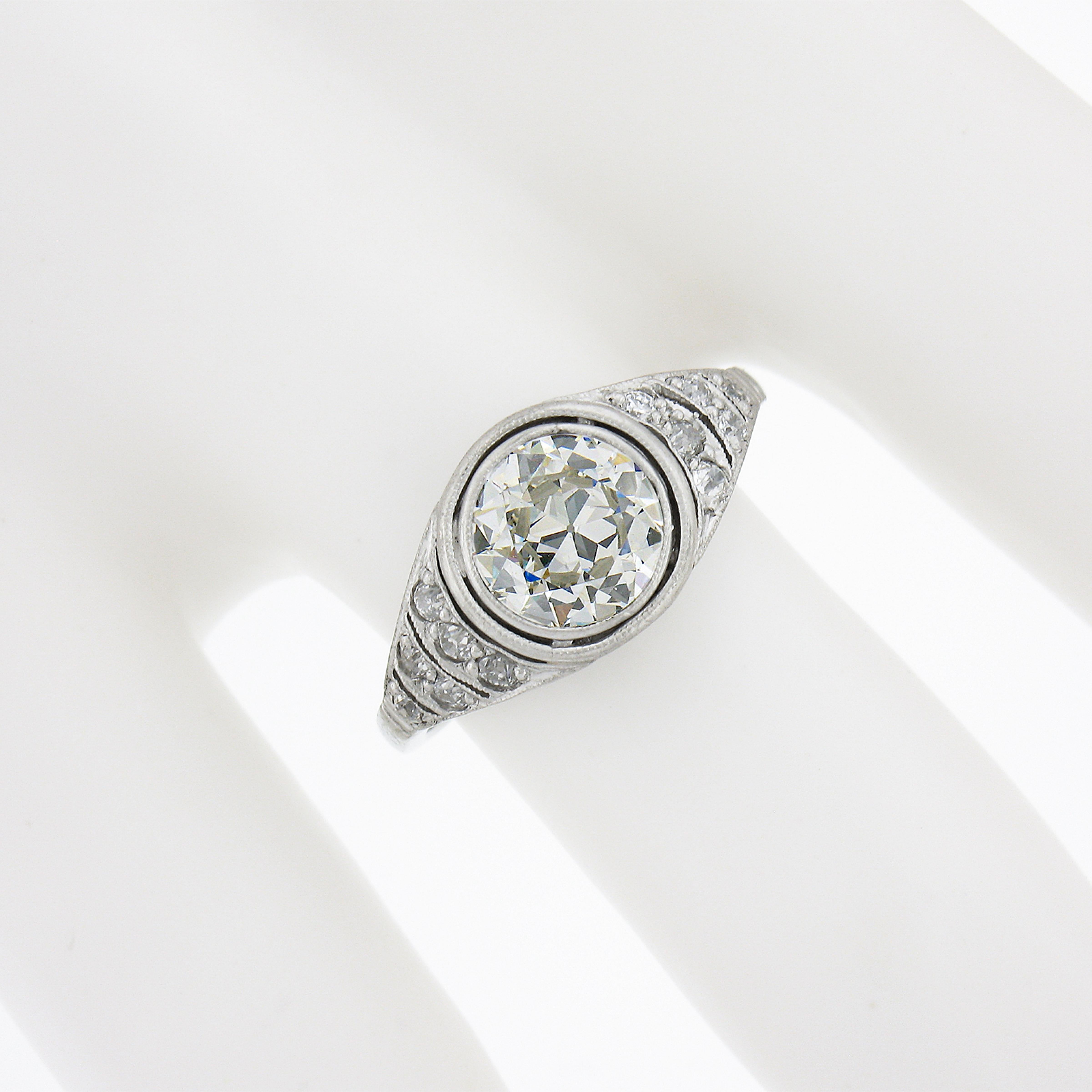 Antique Edwardian Platinum 1.48ctw Old European Diamond Bezel Engagement Ring In Good Condition In Montclair, NJ