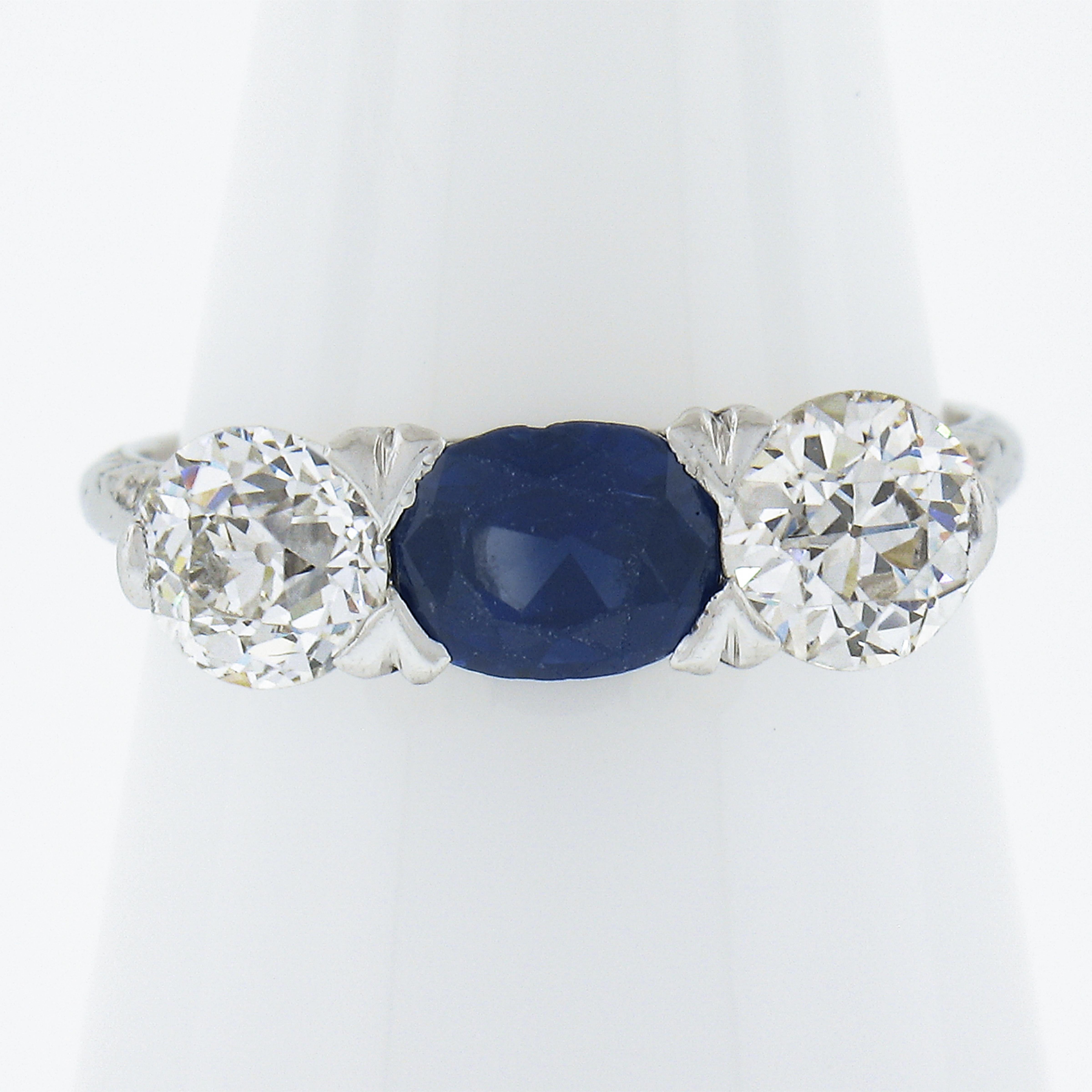 --Stone(s):--
(1) Natural Genuine Sapphire - Cushion Cut - Prong Set - True Royal Blue Color - 0.80-1.0ct (approx. based on certification)
** See Certification Details Below for Complete Info **
(2) Natural Genuine Diamonds - Old European Cut -