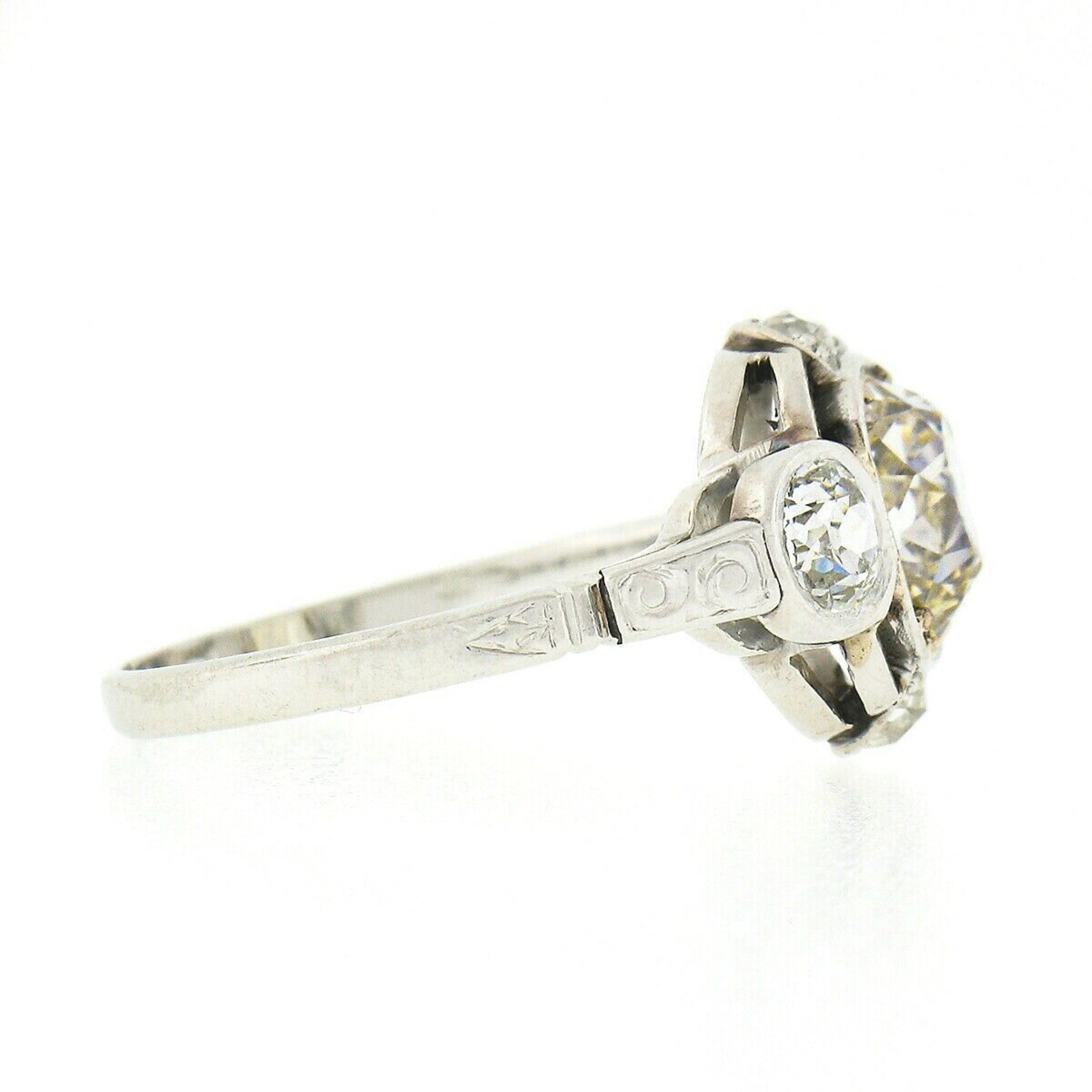 Antique Edwardian Platinum 2.40ct Old Mine Cut Diamond Solitaire Engagement Ring In Good Condition In Montclair, NJ