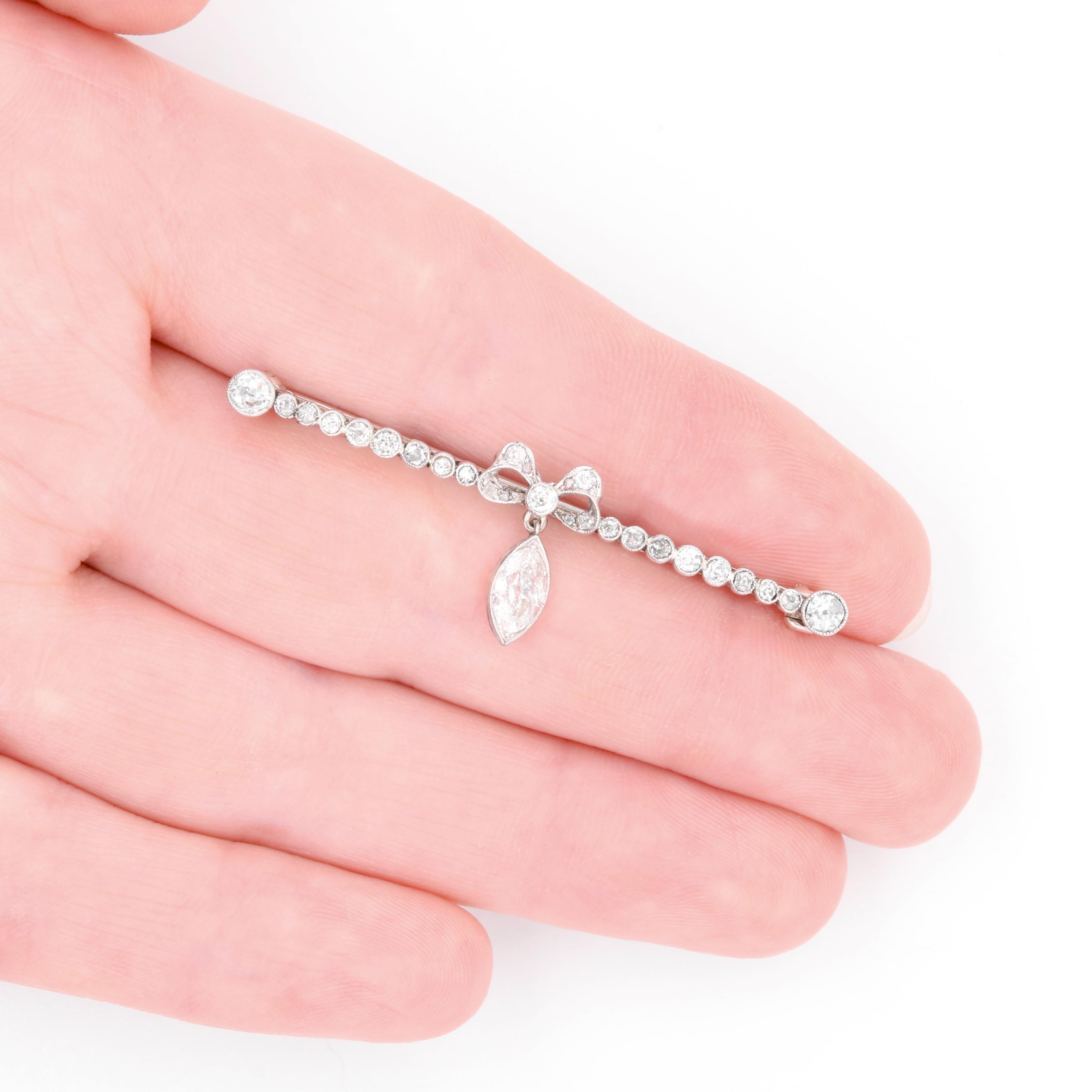 Antique Edwardian Platinum and White Gold 1.18ctw Marquise Diamond Bow Brooch For Sale 6