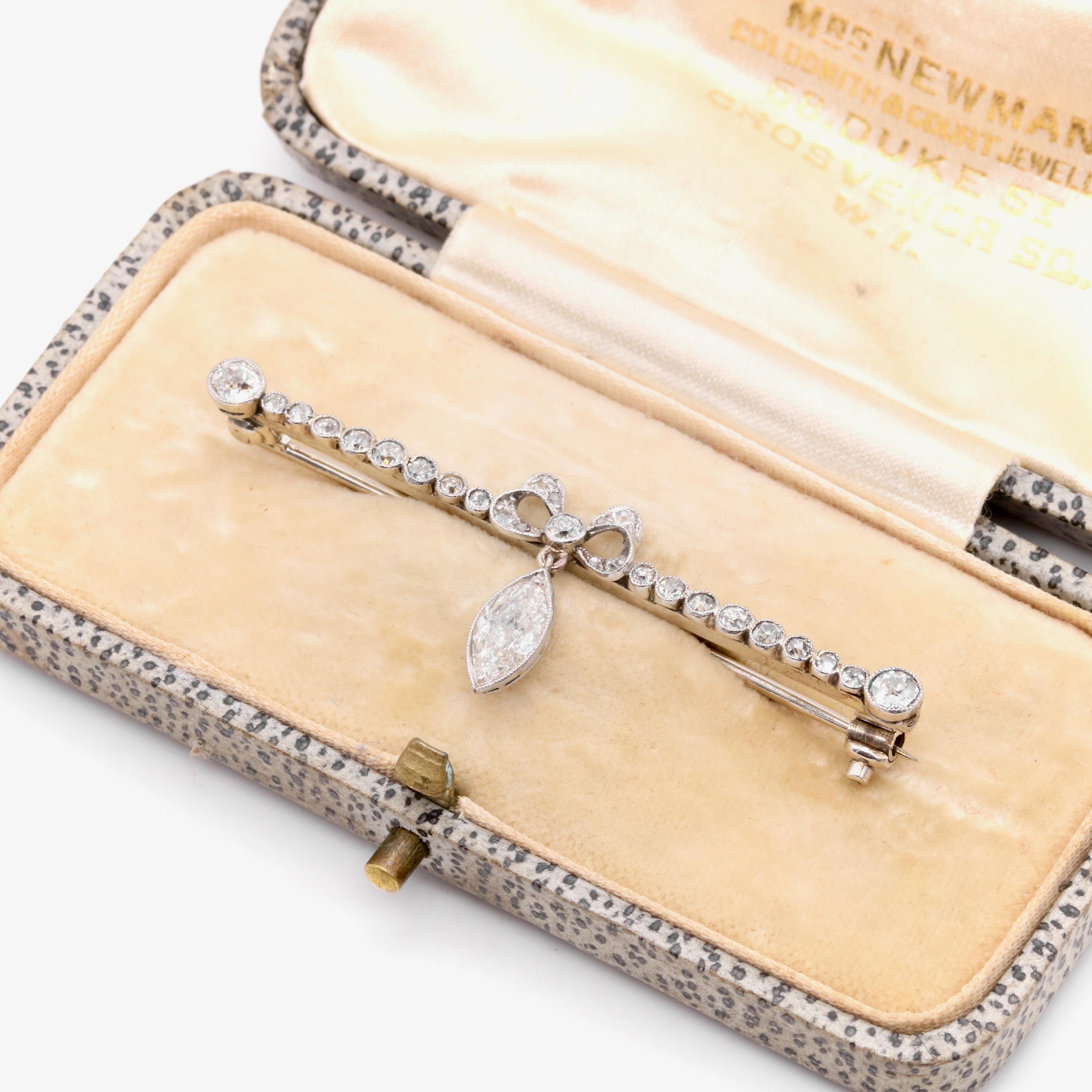 An antique diamond, platinum, and white gold brooch, comprising one large marquise shaped old cut diamond, twenty-three old cut diamonds, and four rose cut diamonds, in platinum and 9 karat white gold. 

My favourite thing about this Antique