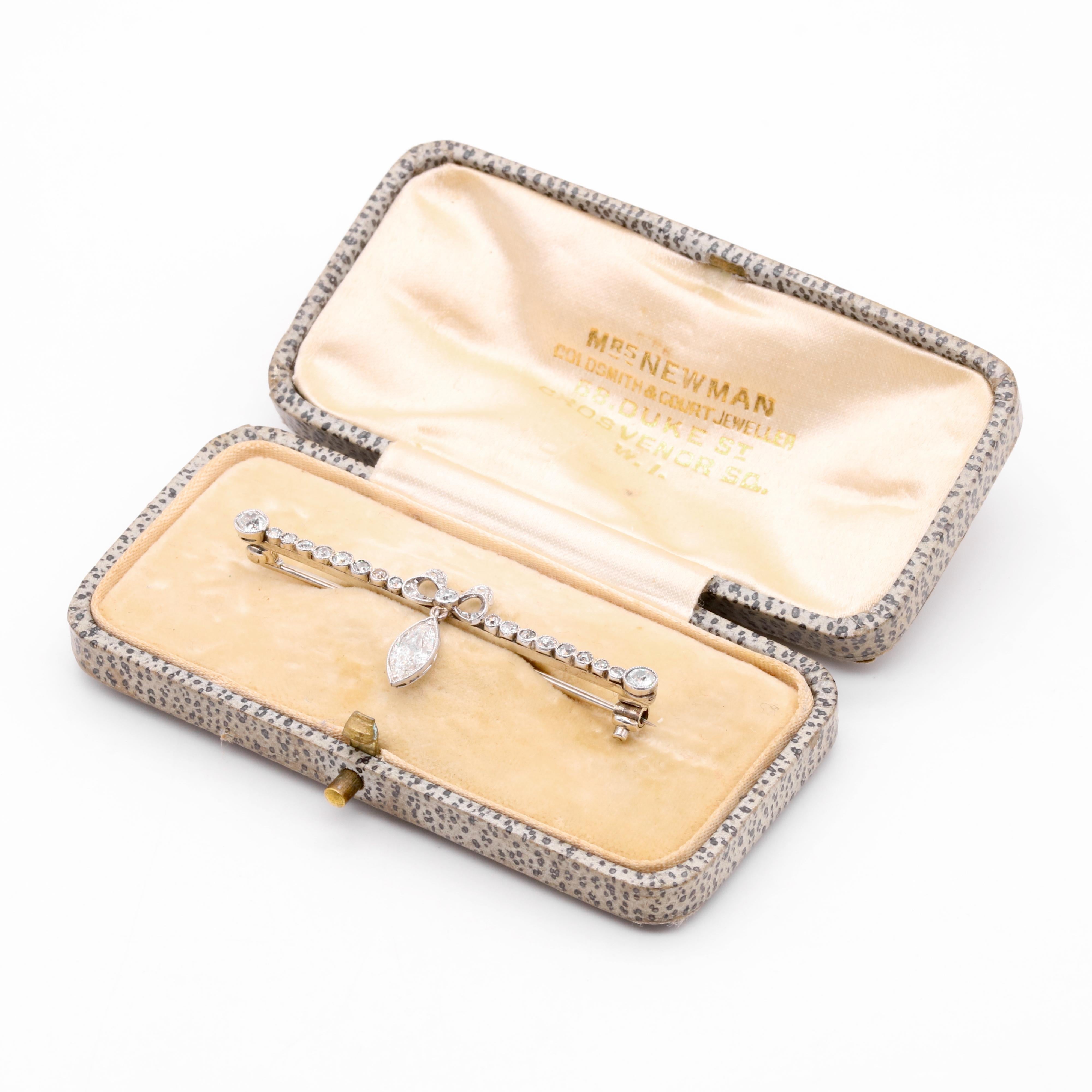 Marquise Cut Antique Edwardian Platinum and White Gold 1.18ctw Marquise Diamond Bow Brooch For Sale
