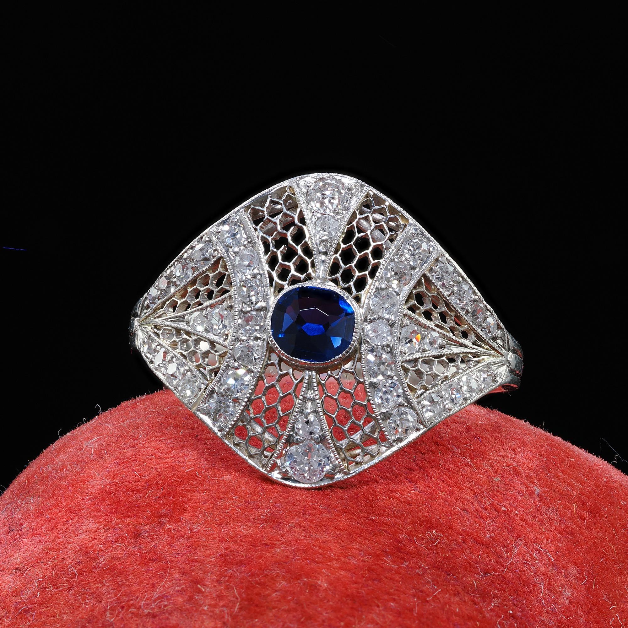 Beautiful Antique Edwardian Platinum and White Gold Diamond Sapphire Filigree Ring - GIA. This gorgeous Edwardian diamond and sapphire ring is crafted in platinum and white gold. This ring features a natural sapphire in the center that has a GIA