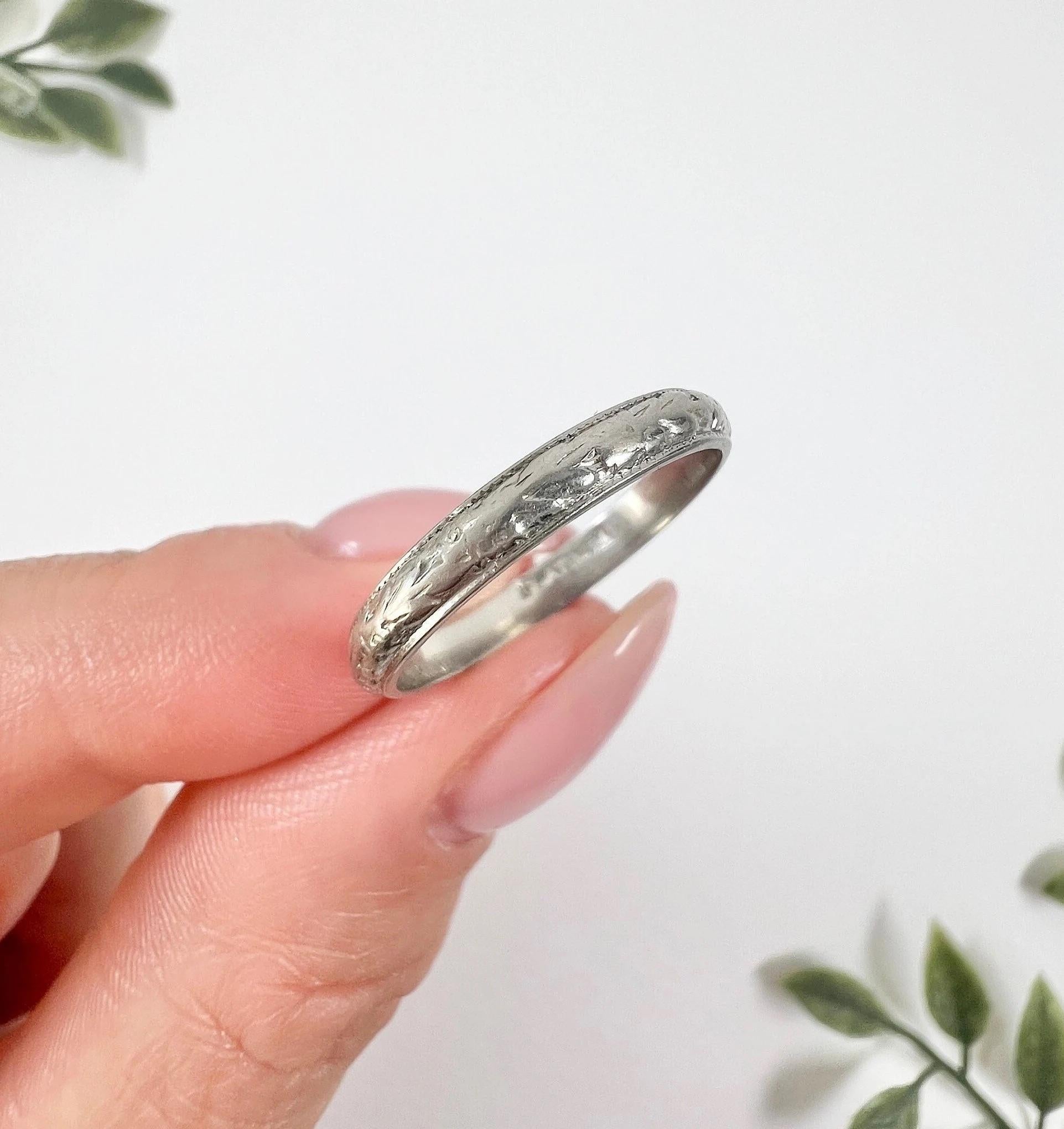 Antique Platinum Band

Circa 1910s

Platinum Stamped

This lovely platinum band is decorated with a hand-engraved pattern all the way around. The band is stamped platinum on the inside ensuring its quality and authenticity. Its refined design and