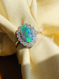 Antique, Edwardian, Platinum Black Opal and Diamond Cluster Ring