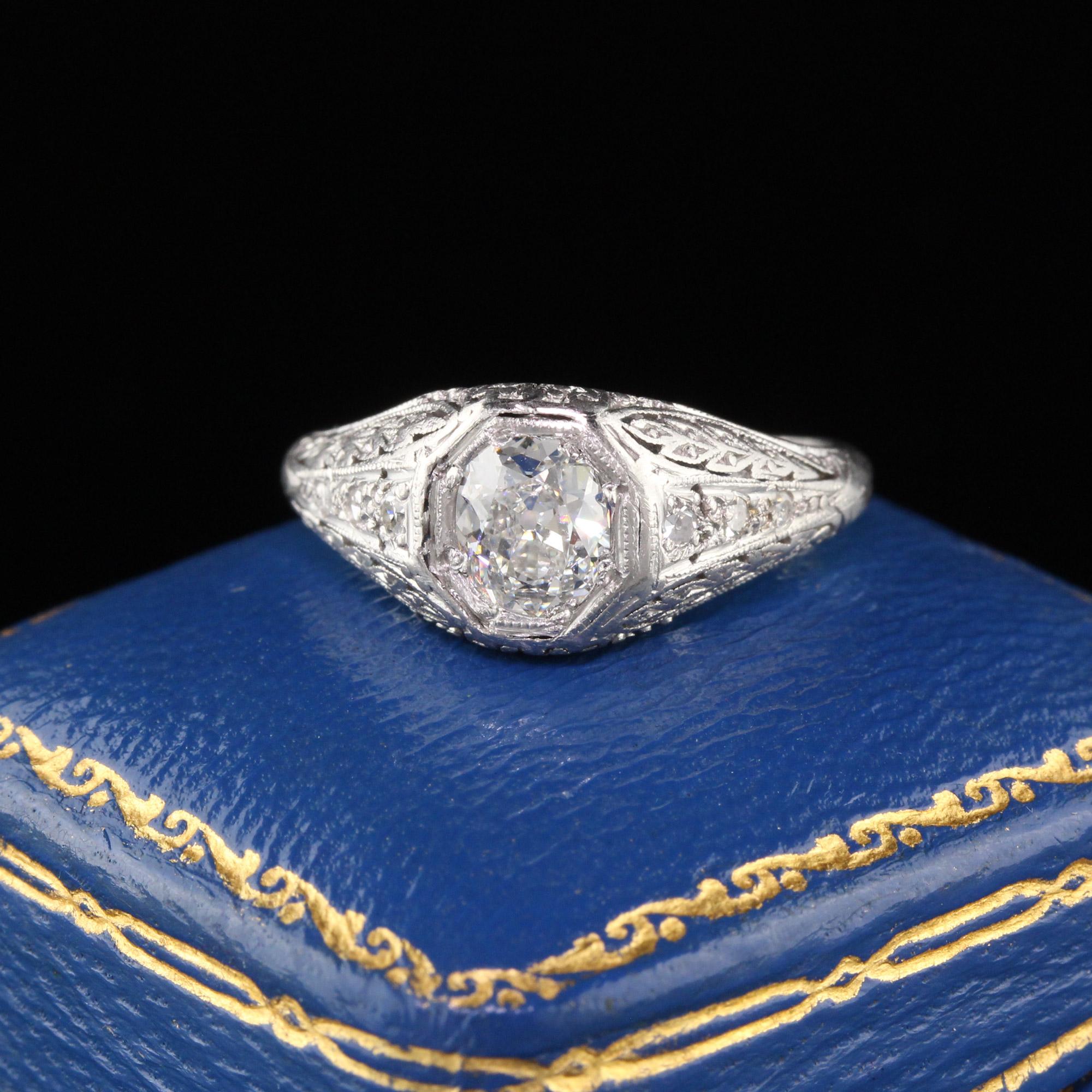 Stunning Edwardian engagement ring with a GIA certified old cushion brilliant cut diamond in the center. Delicate filigree work is in perfect condition. A classic beauty!

#R0295

Metal: Platinum

Weight: 4.2 Grams

Center Diamond Weight: 0.64 cts