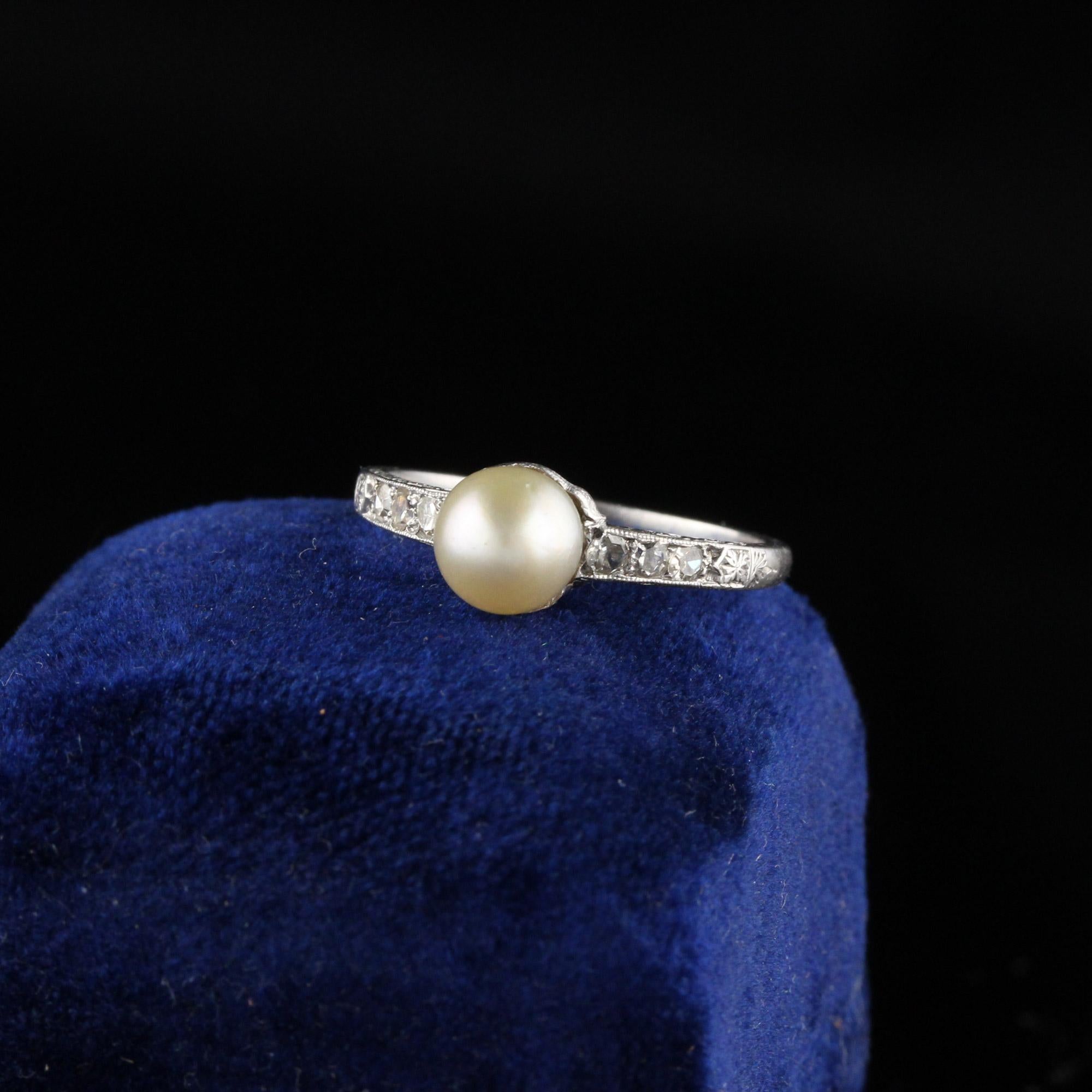 Beautiful Natural Pearl ring with 6 total diamonds. 

Item #R0465

Metal: Platinum 

Weight: 3.0 Grams

Total Diamond Weight: Approximately 0.20 cts

Diamond Color: H

Diamond Clarity: SI2

Natural Pearl Measurement: 6.2 mm

Ring Size: 6.0 

This