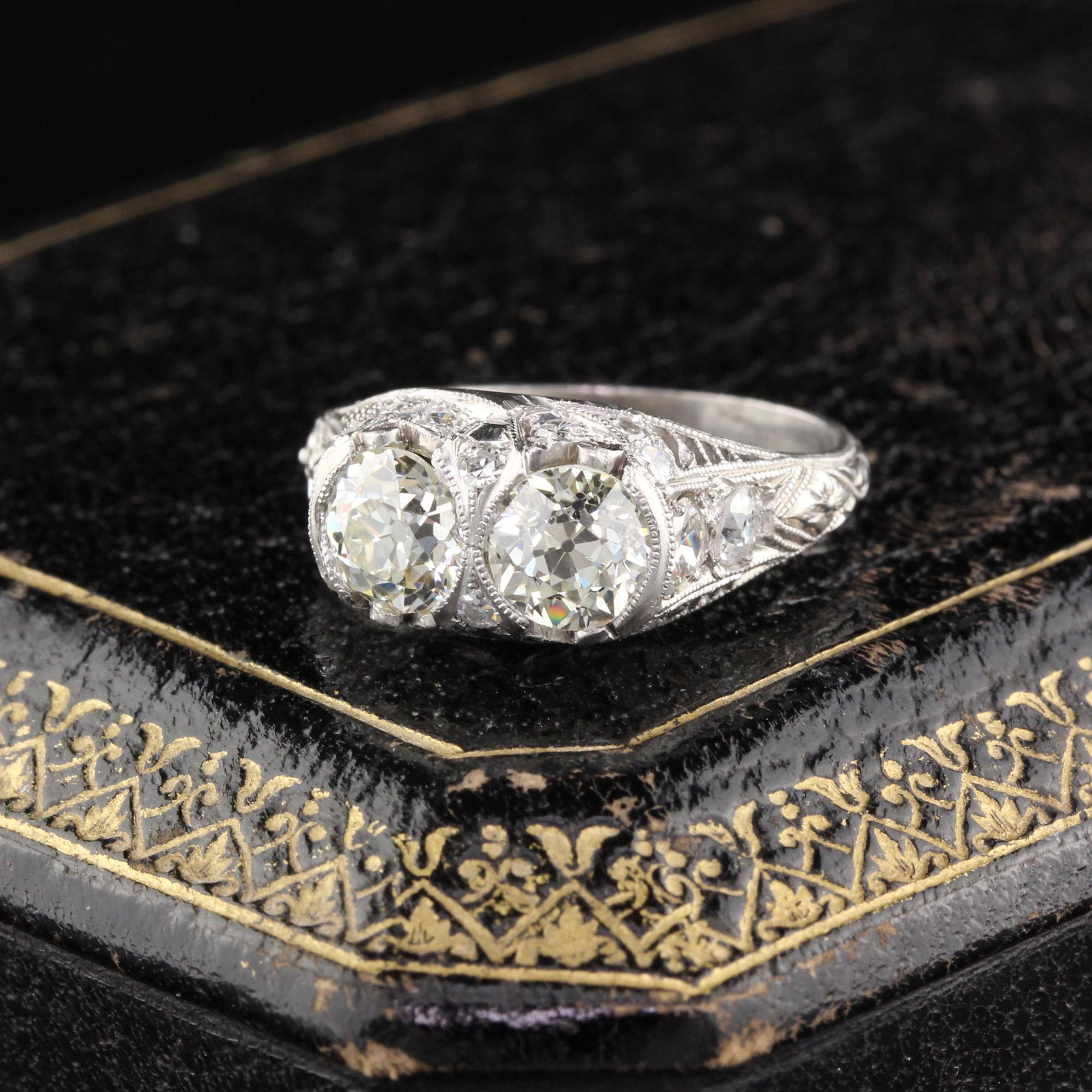 Stunning Edwardian 2-stone engagement ring in platinum with detailed filigree & engravings. The diamonds are sparkly & lively!

Item #R0142

Metal: Platinum 

Weight: 4.6 Grams

Center Diamond Weight: 0.83 cts & 0.84 cts

Center Diamond Color: