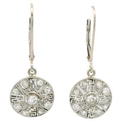Orecchini antichi edoardiani in platino e oro con chiave greca in filigrana da 0,40 ct.