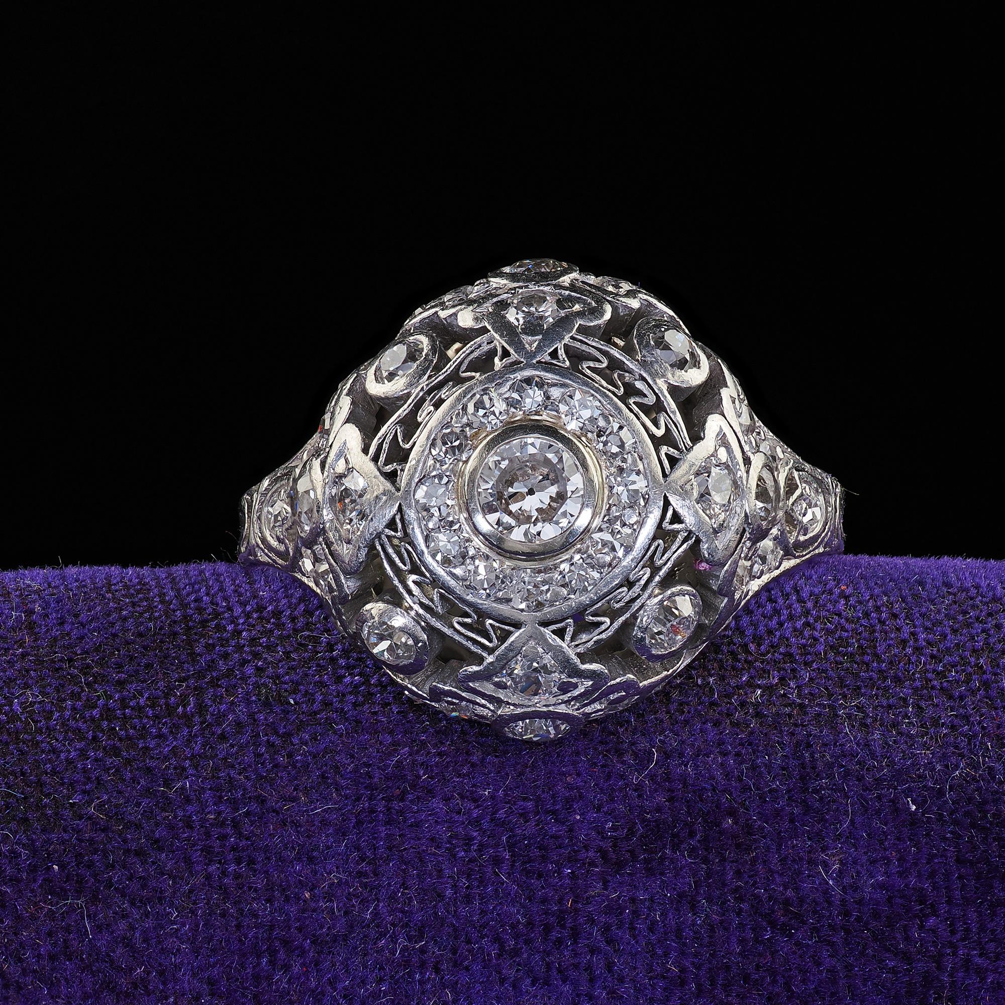 Beautiful Antique Edwardian Platinum Old Cut Diamond Filigree Dome Cocktail Ring. This beautiful Antique Edwardian old cut diamond ring is crafted in platinum. The ring features beautiful old cut diamonds set throughout a gorgeous filigree Edwardian