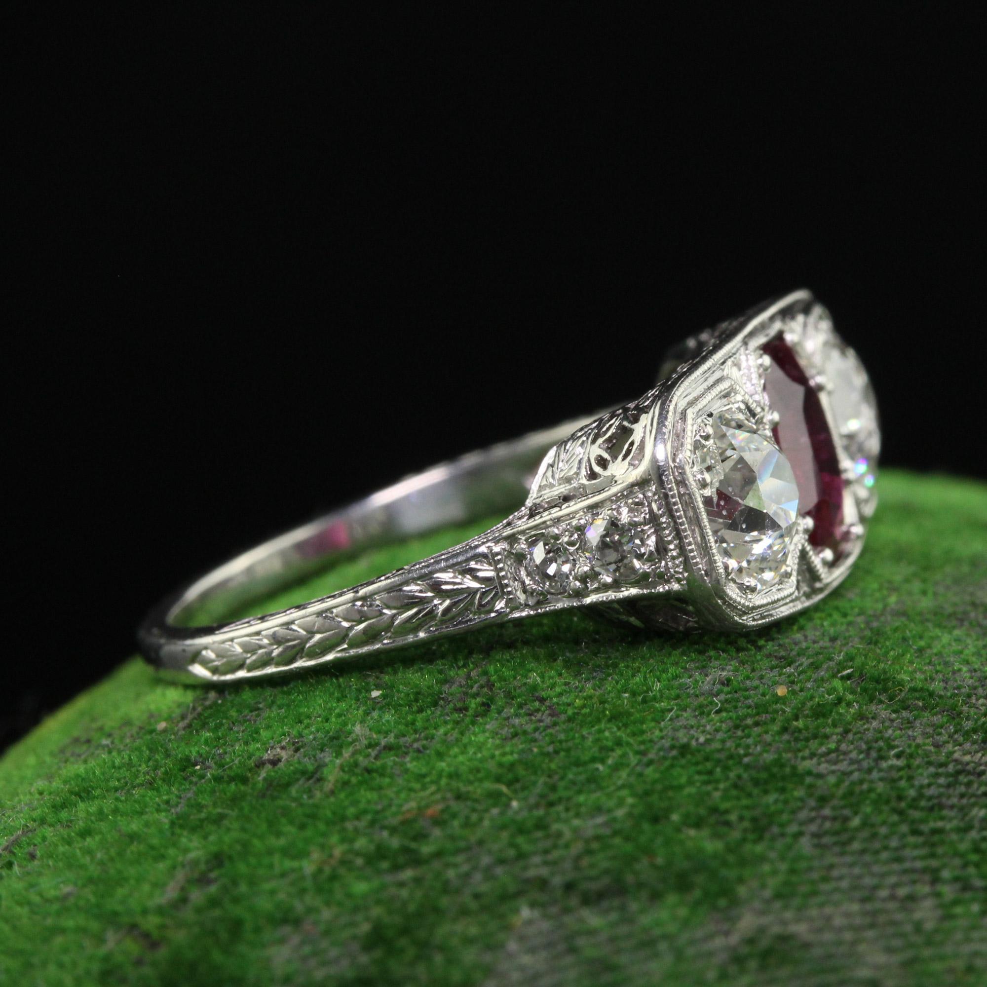 Antique Edwardian Platinum Old Euro Diamond and No Heat Ruby Three Stone Ring In Good Condition For Sale In Great Neck, NY