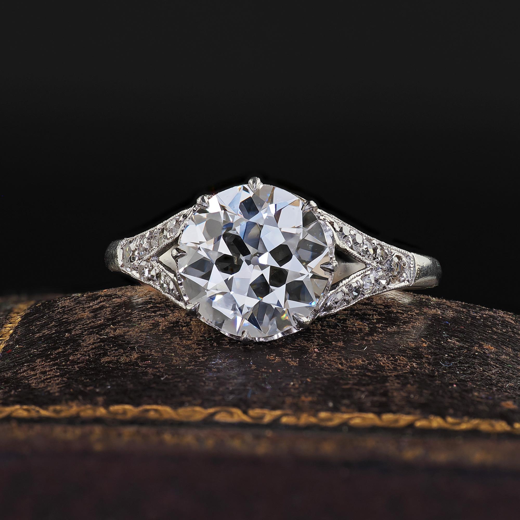 Beautiful Antique Edwardian Platinum Old Euro Diamond Low Profile Engagement Ring - GIA. This gorgeous Edwardian old Euro diamond engagement ring is crafted in platinum. This amazing ring features a bright old European cut diamond in the center that