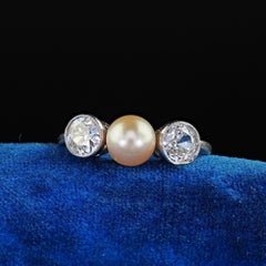 Antique Edwardian Platinum Old European Diamond and Pearl Three Stone Ring