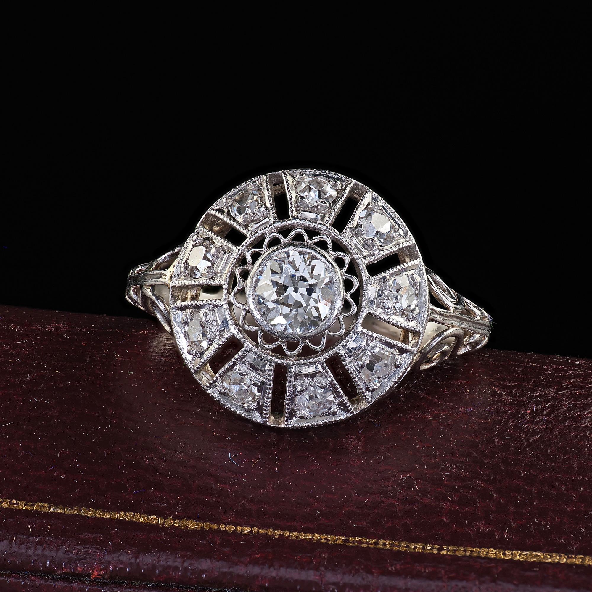 Beautiful Antique Edwardian Platinum Old European Diamond Filigree Engagement Ring. This beautiful Edwardian old European cut diamond engagement ring is crafted in platinum. The ring features gorgeous old cut diamonds set throughout the top of the