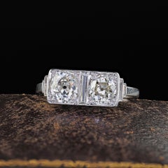 Antique Edwardian Platinum Old Mine Diamond and Baguette Toi et Moi Ring