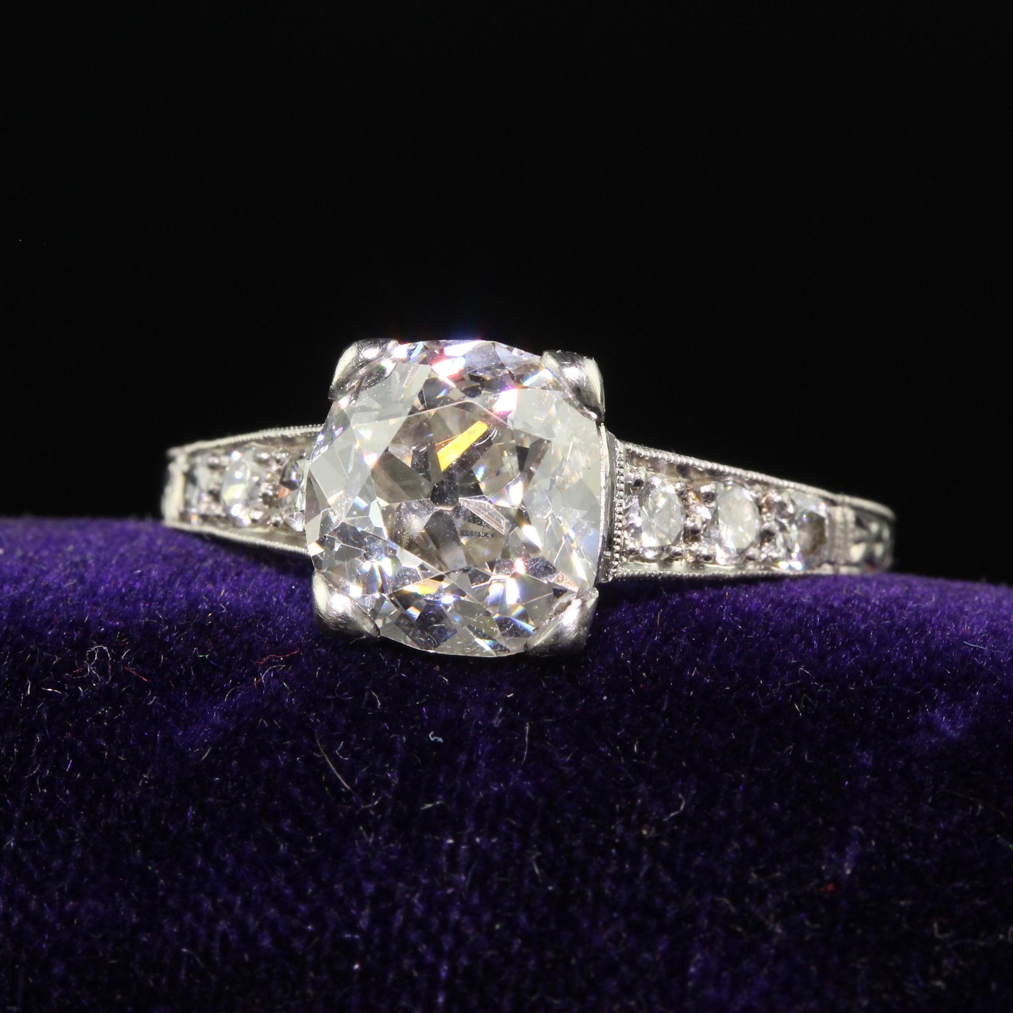 Beautiful Antique Edwardian Platinum Old Mine Diamond Filigree Engagement Ring - GIA. This beautiful old mine diamond engagement ring is crafted in platinum. This ring features a gorgeous old mine cut diamond in the center that has a GIA report. The