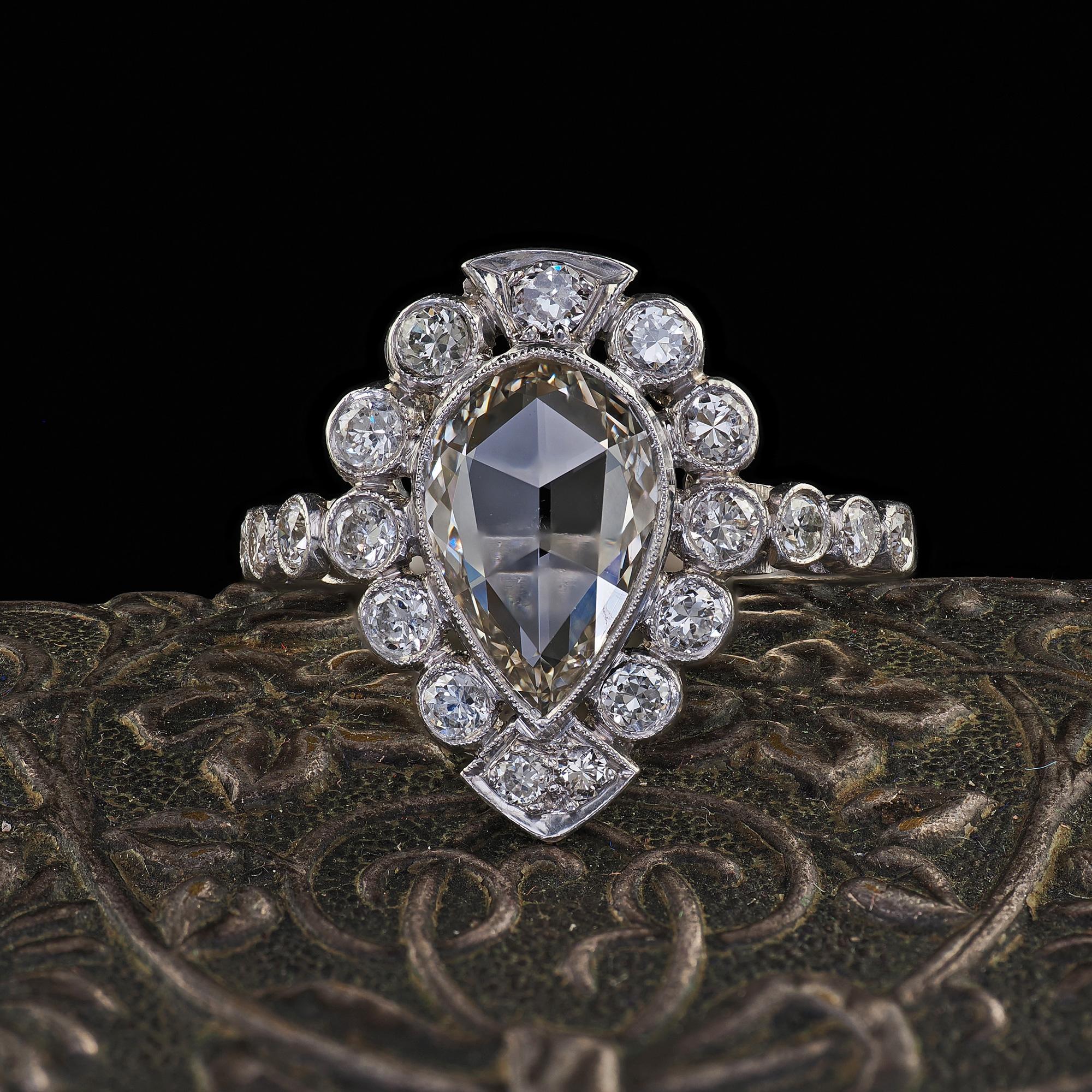 Beautiful Antique Edwardian Platinum Old Rose Cut Diamond Engagement Ring - GIA. This gorgeous Edwardian old rose cut engagement ring is crafted in platinum. The ring features a beautiful old rose cut diamond in the center of a gorgeous Edwardian