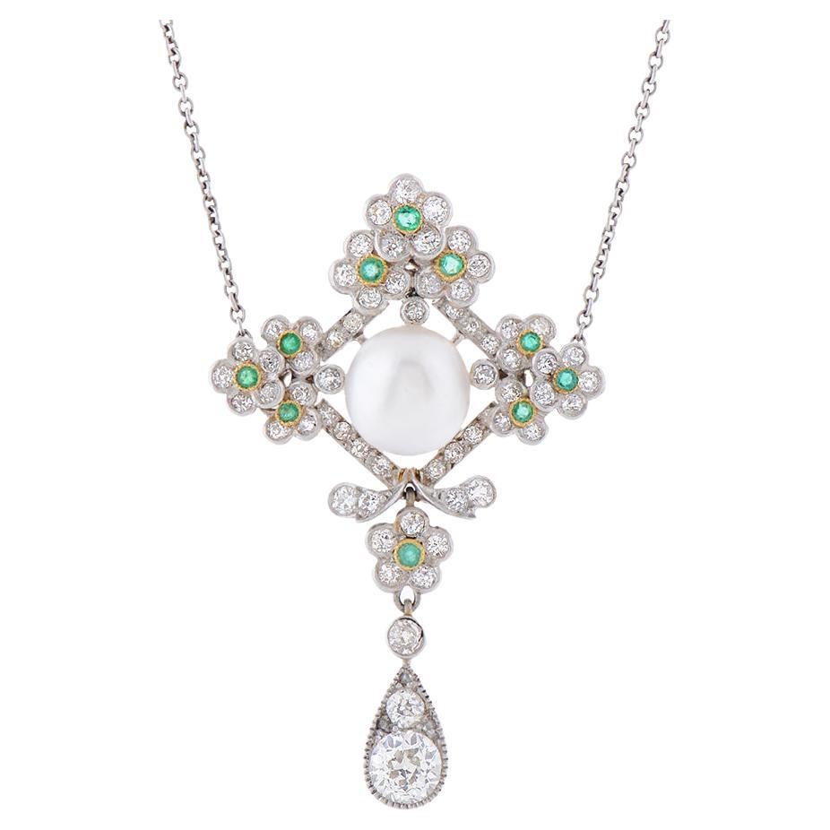 Antique Edwardian Platinum, Pearl, Diamond and Emerald Cross Pendant For Sale