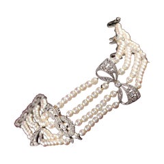 Antikes edwardianisches Perlenarmband aus Platin mit Diamanten im Rosenschliff und Schleife
