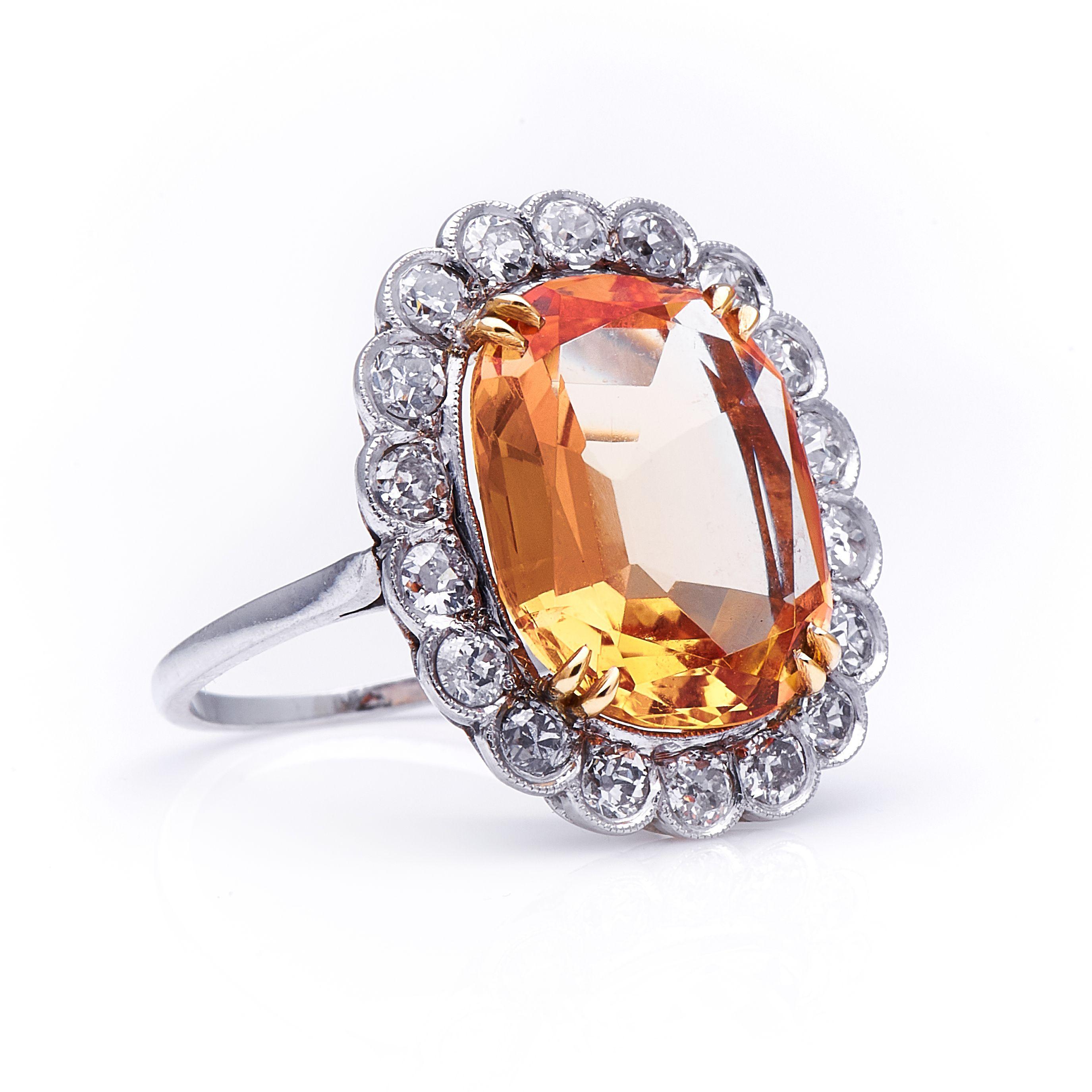Imperial Topaz and diamond ring, circa 1900. The pale, golden yellow of this topaz is perhaps the colour most historically associated with the stone, which shot to popularity in the late 18thand early 19thcenturies due to its flattering and delicate