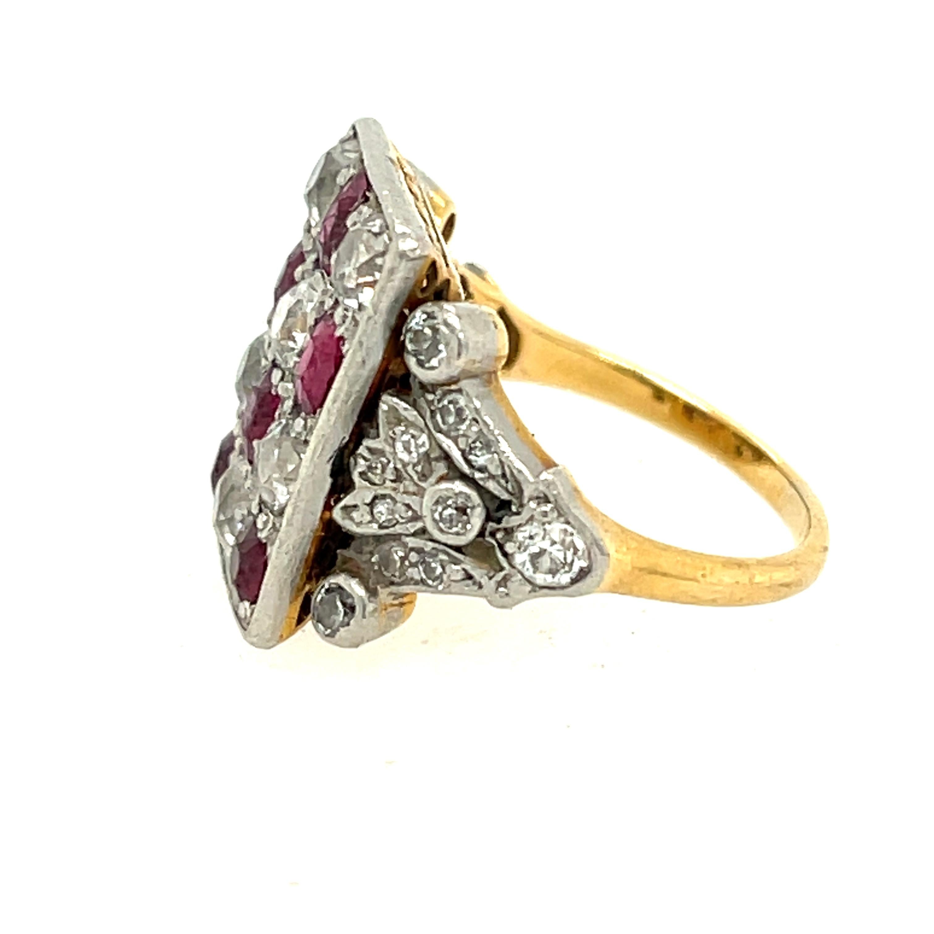 Antique Edwardian platinum topped 18k yellow gold diamond ruby ring, circa 1900.  This unique ring features a checkerboard pattern of alternating rubies and diamonds, with diamond along the side of the ring. The diamond 26 old mine cut diamonds
