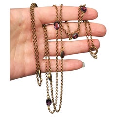 Antique Edwardian purple paste sautoir necklace, gold plated long chain 