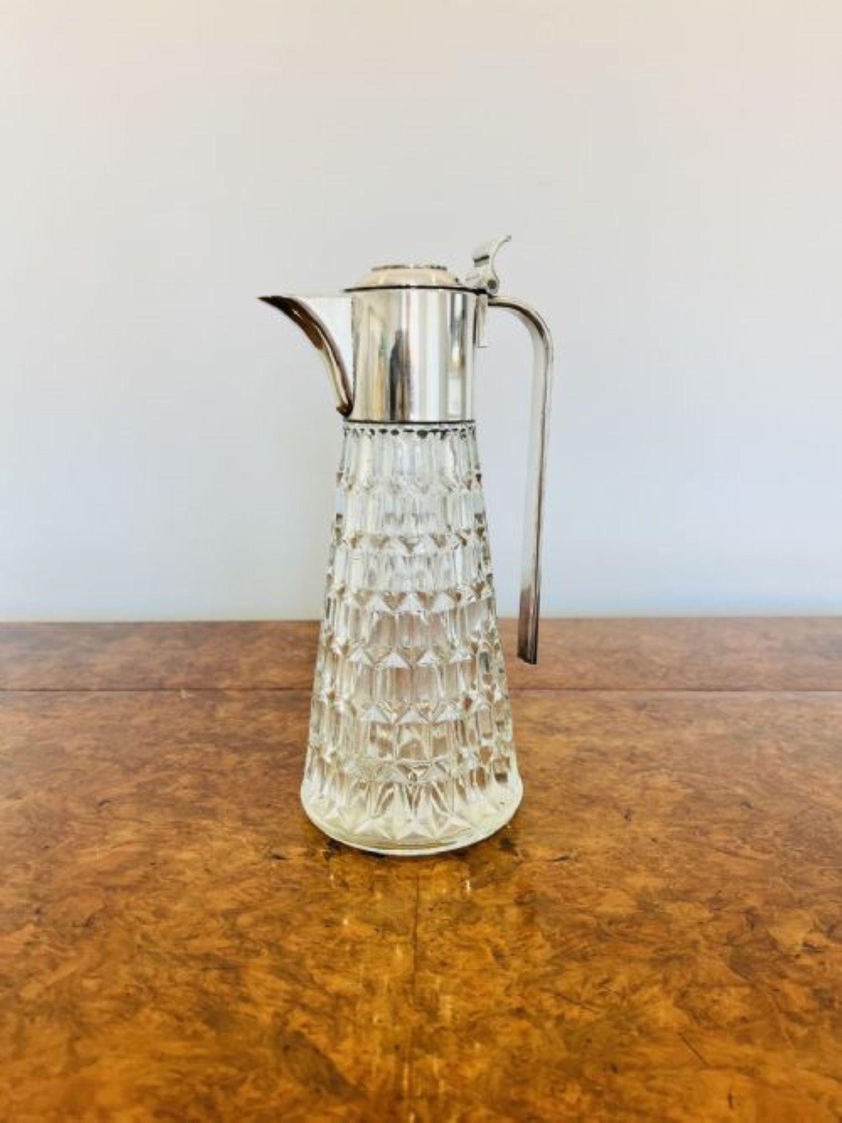 Antique Edwardian quality cut glass and silver plated claret jug having a quality cut glass claret jug with a silver plated handle and lid 