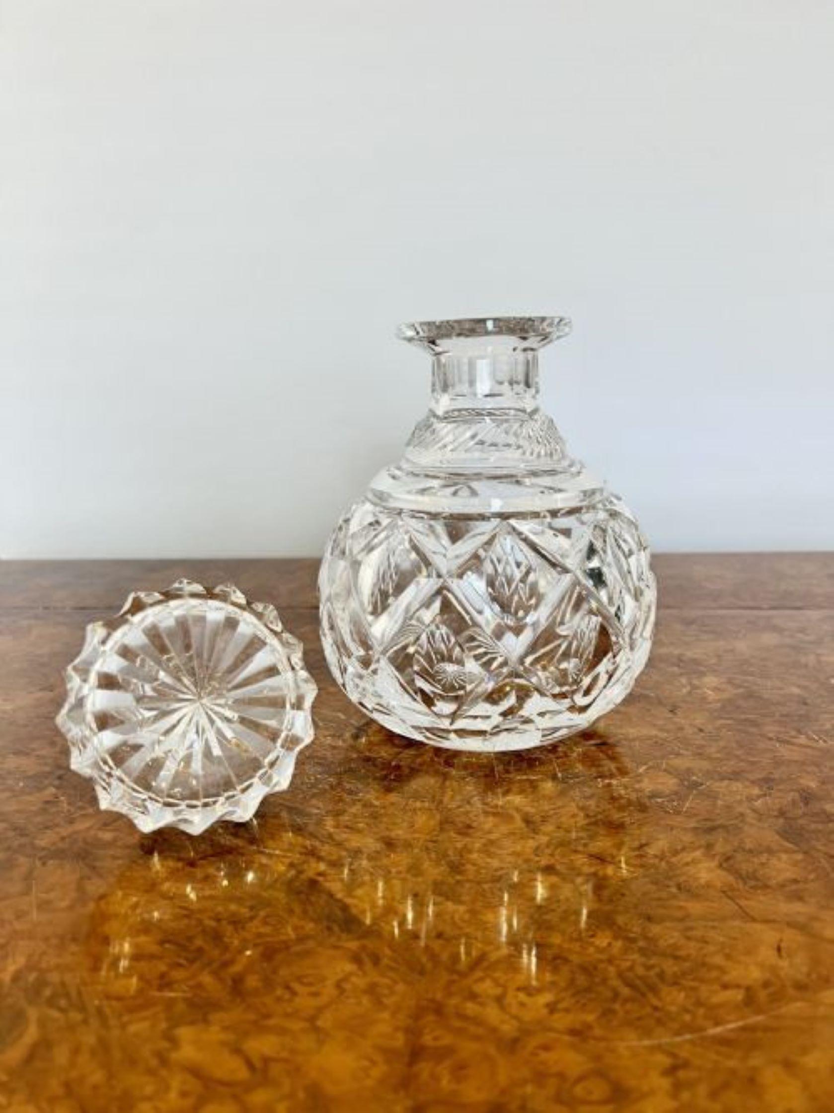 Antique Edwardian quality cut glass decanter having a quality cut glass decanter with the original cut glass shaped stopper 