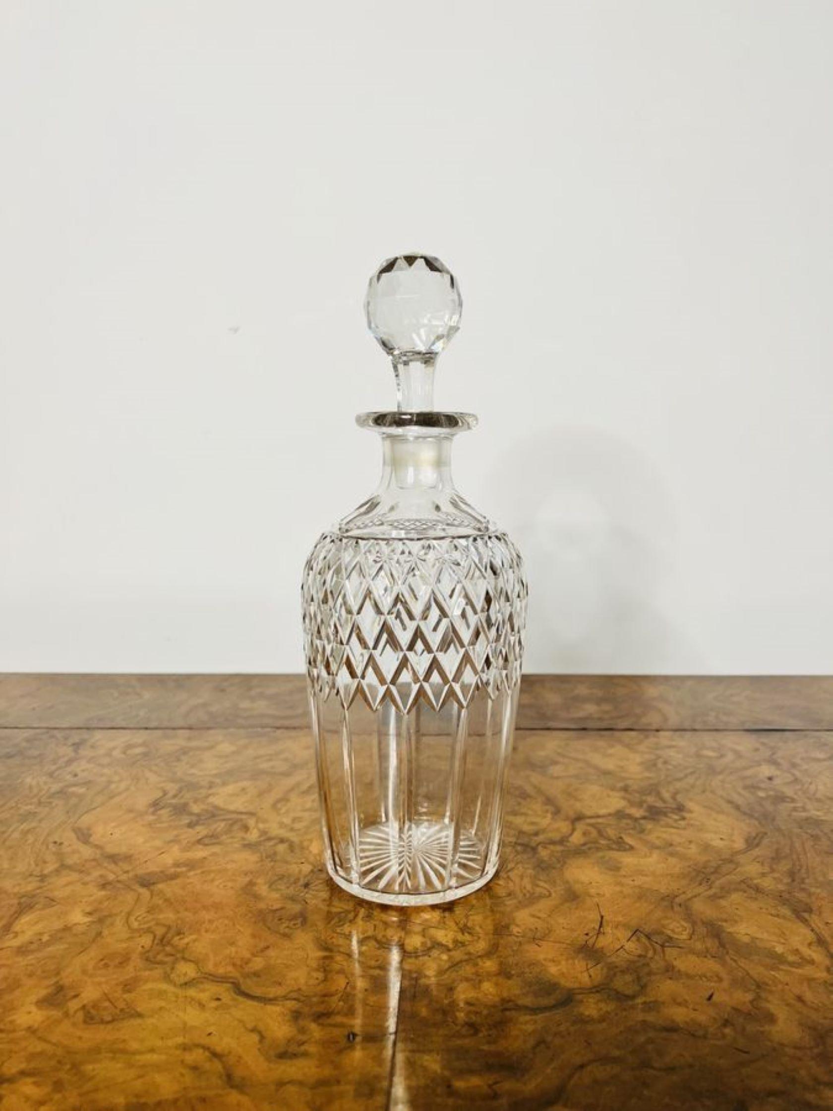 Antique Edwardian quality cut glass decanter having a quality cut glass decanter with the original stopper.

D. 1900