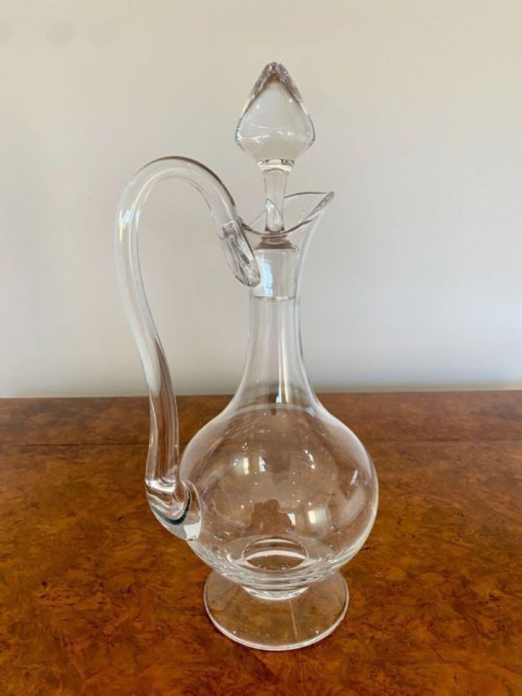 Antique Edwardian quality glass decanter, having a quality shaped glass decanter with a shaped handle and original glass stopper. 