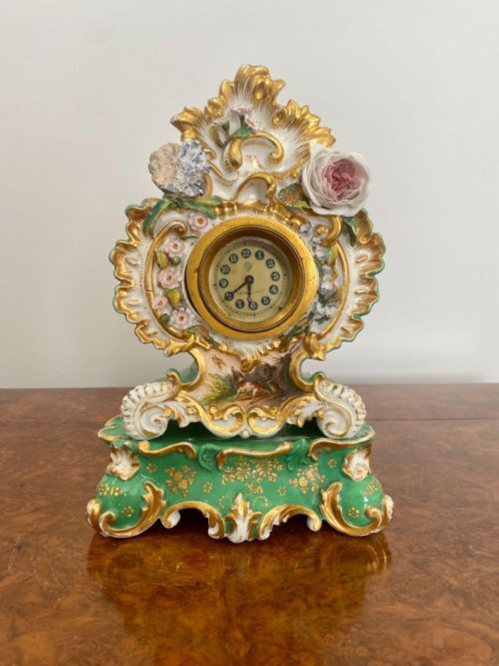 Antique Edwardian quality hand painted porcelain mantle clock having a quality hand painted decorated porcelain clock case with flowers, leaves and scrolls in wonderful green, yellow, pink, blue, white and gold colours movement by the British United