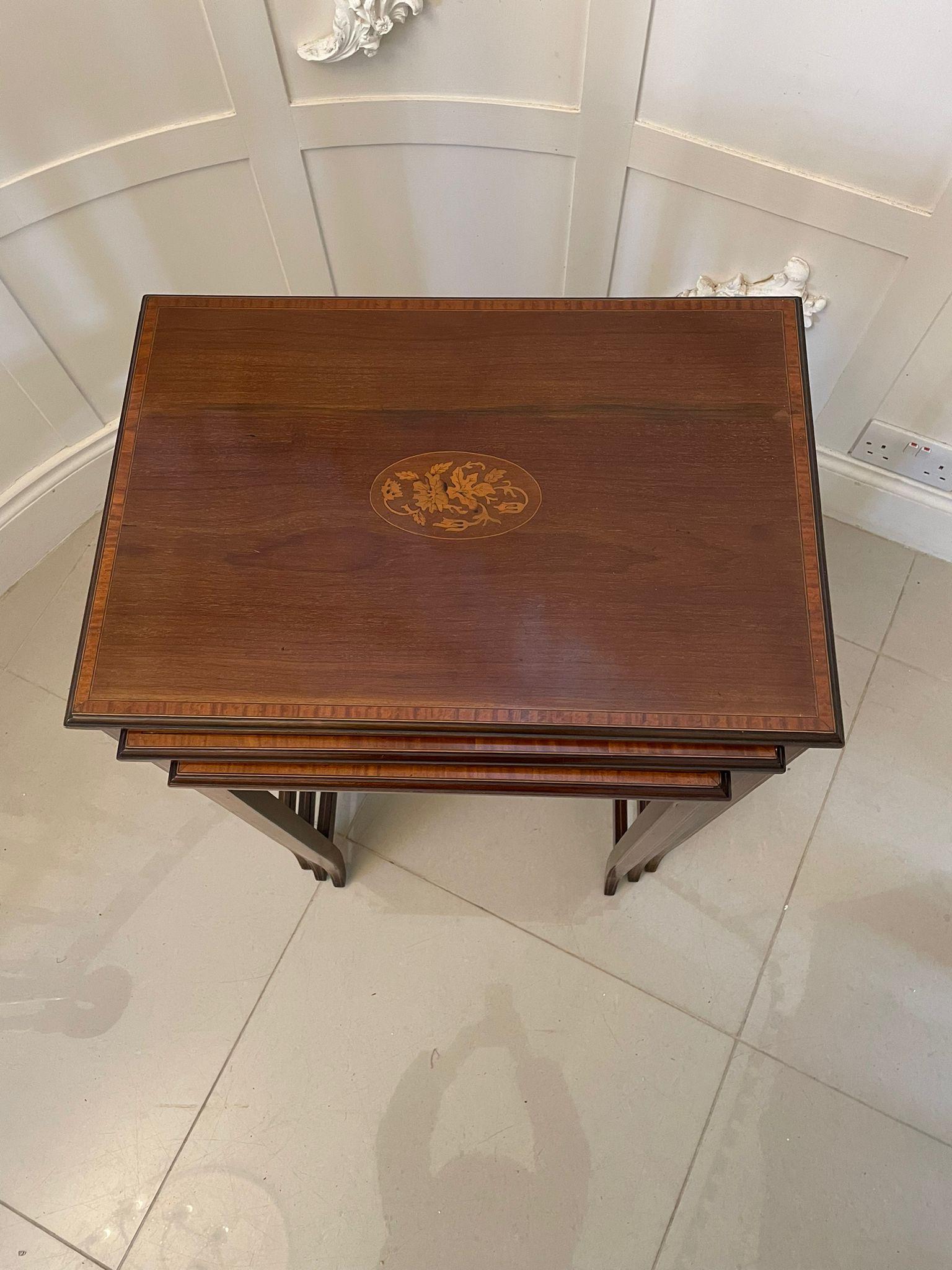 Antique Edwardian quality mahogany inlaid nest of three tables having quality pretty mahogany inlaid and satinwood crossbanded tops standing on square mahogany inlaid tapering legs united by inlaid mahogany stretchers.

Measures: H 73.5 x W58 x D