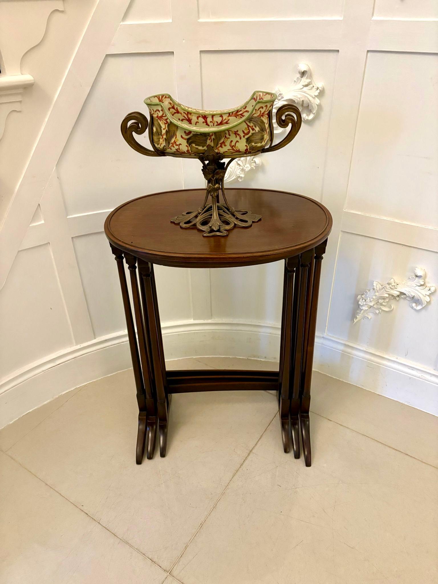 Antique Edwardian quality mahogany nest of 3 tables having quality mahogany oval tops with a beaded edge supported by turned tapering columns standing on shaped feet united by a mahogany stretcher

A charming set in lovely original