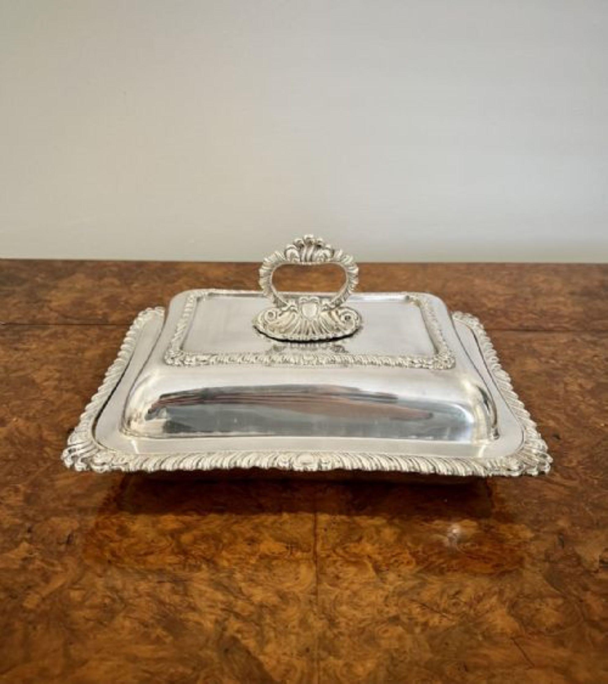 Antique Edwardian quality ornate silver plated rectangular entrée dish having a quality rectangular silver plated entrée dish with a lift off lid and removable ornate handle 