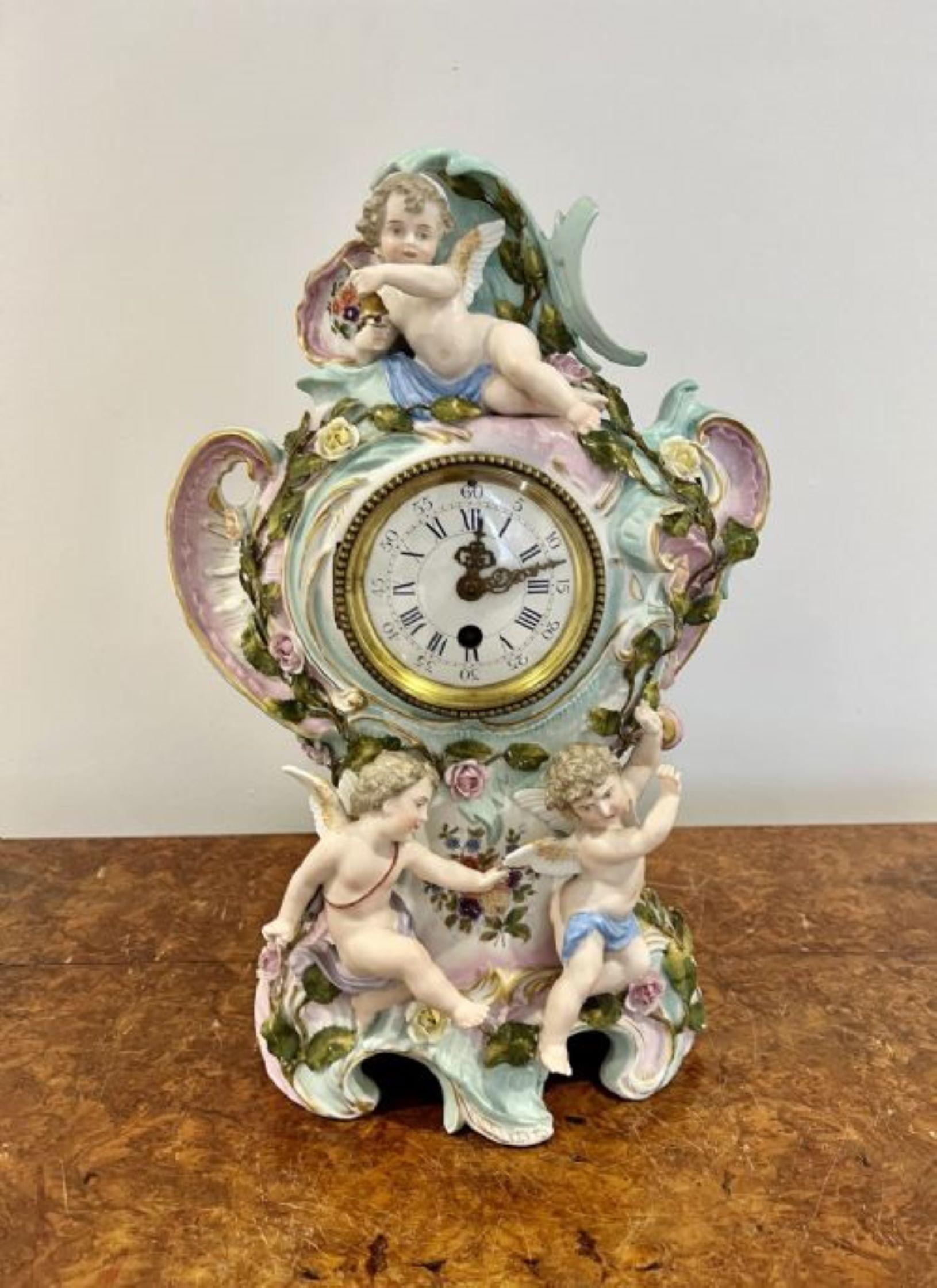 Antique Edwardian quality porcelain mantel clock, having a quality continental sitzendorf porcelain case with figures, flowers, leaves, swags and scrolls in wonderful blue, green, white and pink colours. Circular dial with original brass hands and