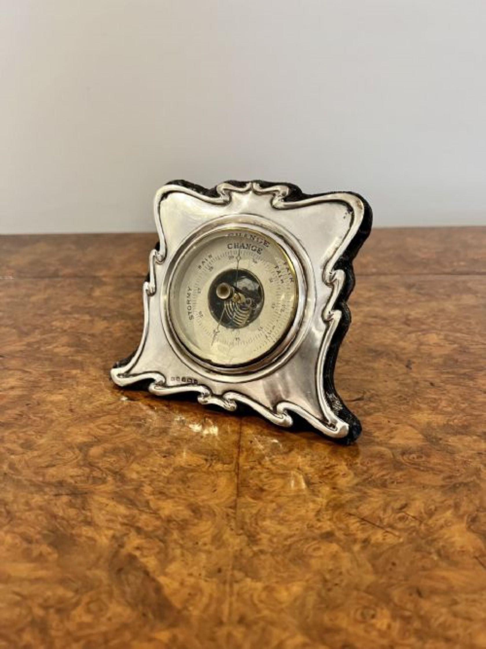 Antique Edwardian quality silver framed desk barometer having a quality antique desk barometer in a silver shaped frame, with a circular barometer having a bevelled edge glass with the original hands. 