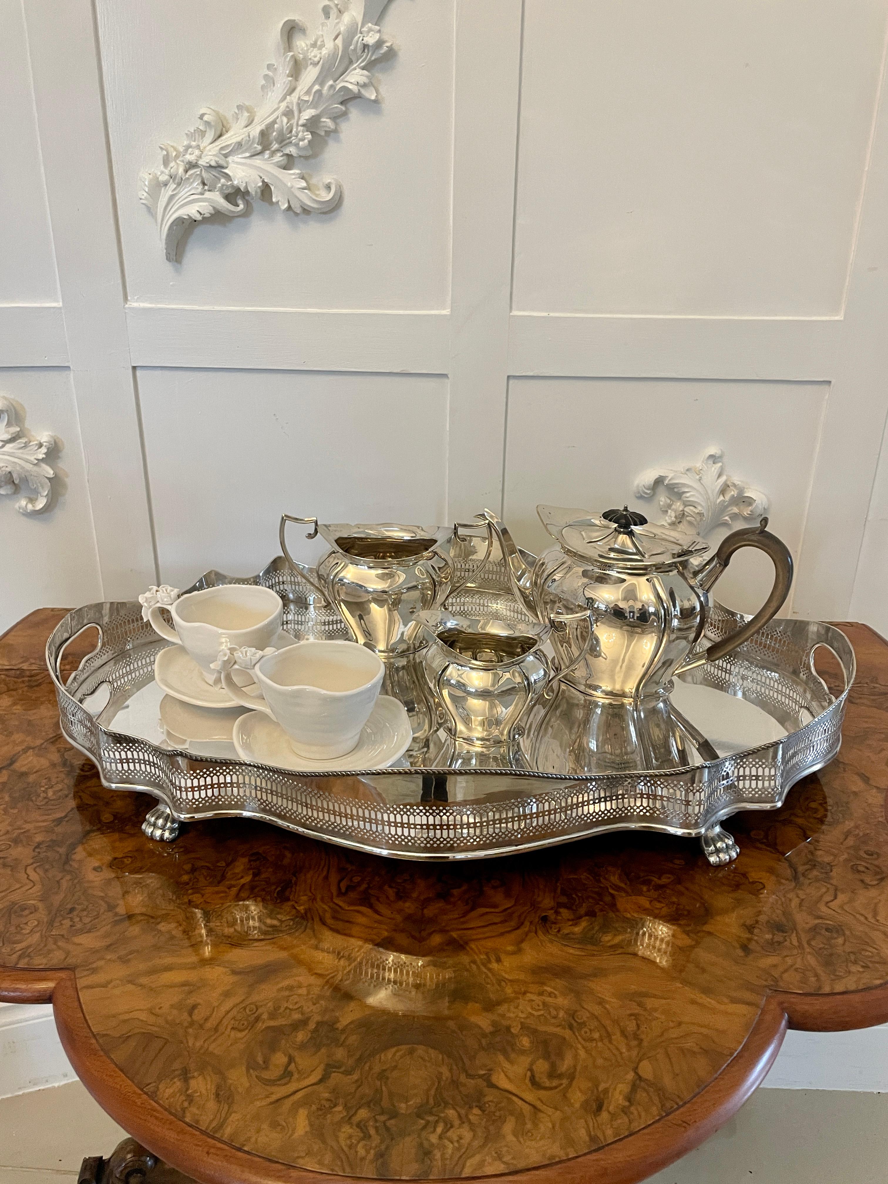 Antique Edwardian quality silver plated tea set consisting of a teapot, sugar bowl and milk jug 


A lovely pretty set in wonderful original condition


Dimensions:
Teapot 16 x 27 x 13 cm
Milk Jug 10 x 13.5 x 7.5 cm
Sugar Bowl 10 x 18 x 9 cm


Dated