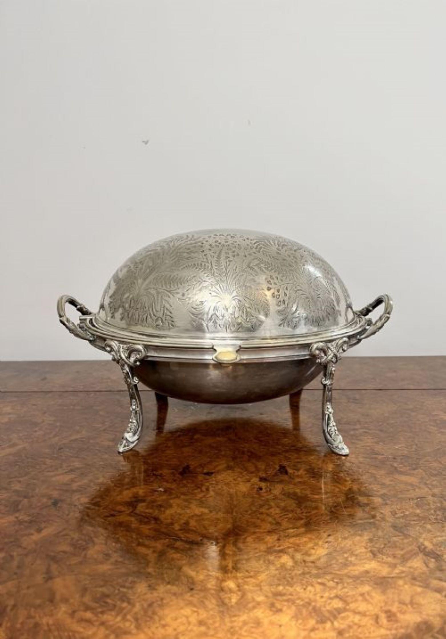 Antique Edwardian quality silver plated turnover dish having a quality silver plated turnover dish with a removable inside, two carrying handles standing on elegant ornate legs.
