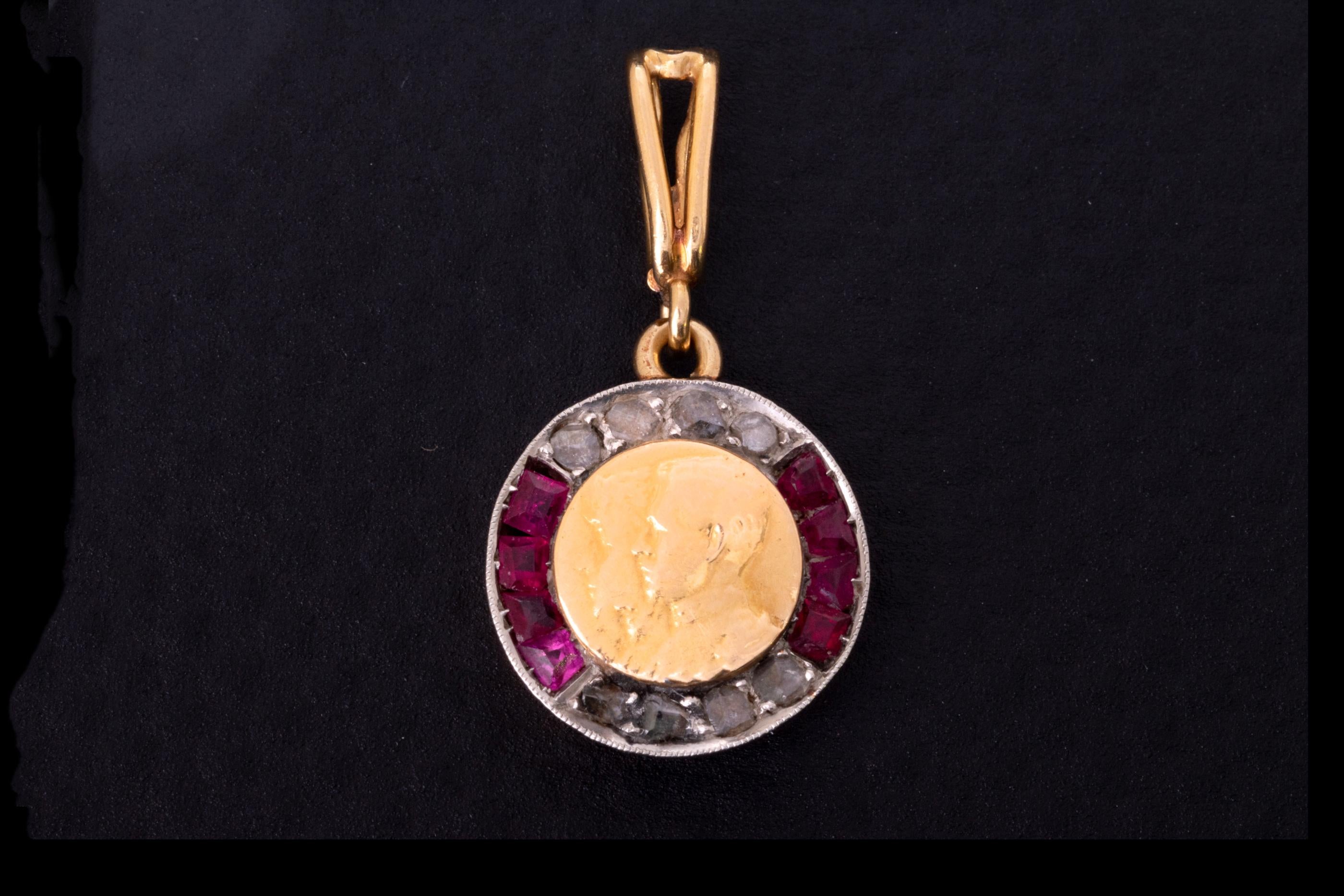 A rare collectible Edwardian charm pendant depicting a royal couple. This 18 ct gold pendant carries a ba-relief of Queen Alexandra and King Edward VII.

Alexandra of Denmark was Queen of the United Kingdom and the British Dominions, and Empress of