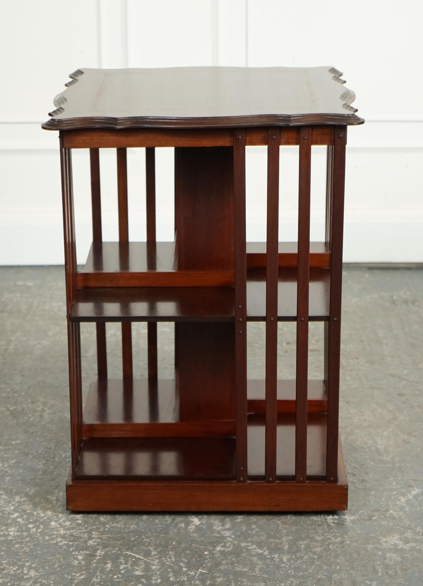 
We are delighted to offer for sale this Edwardian Revolving Bookcase.

The Antique Edwardian Revolving Bookcase with a Serpentine Shaped Top is a true gem from the past, embodying the elegance and craftsmanship of the Edwardian era. Crafted with