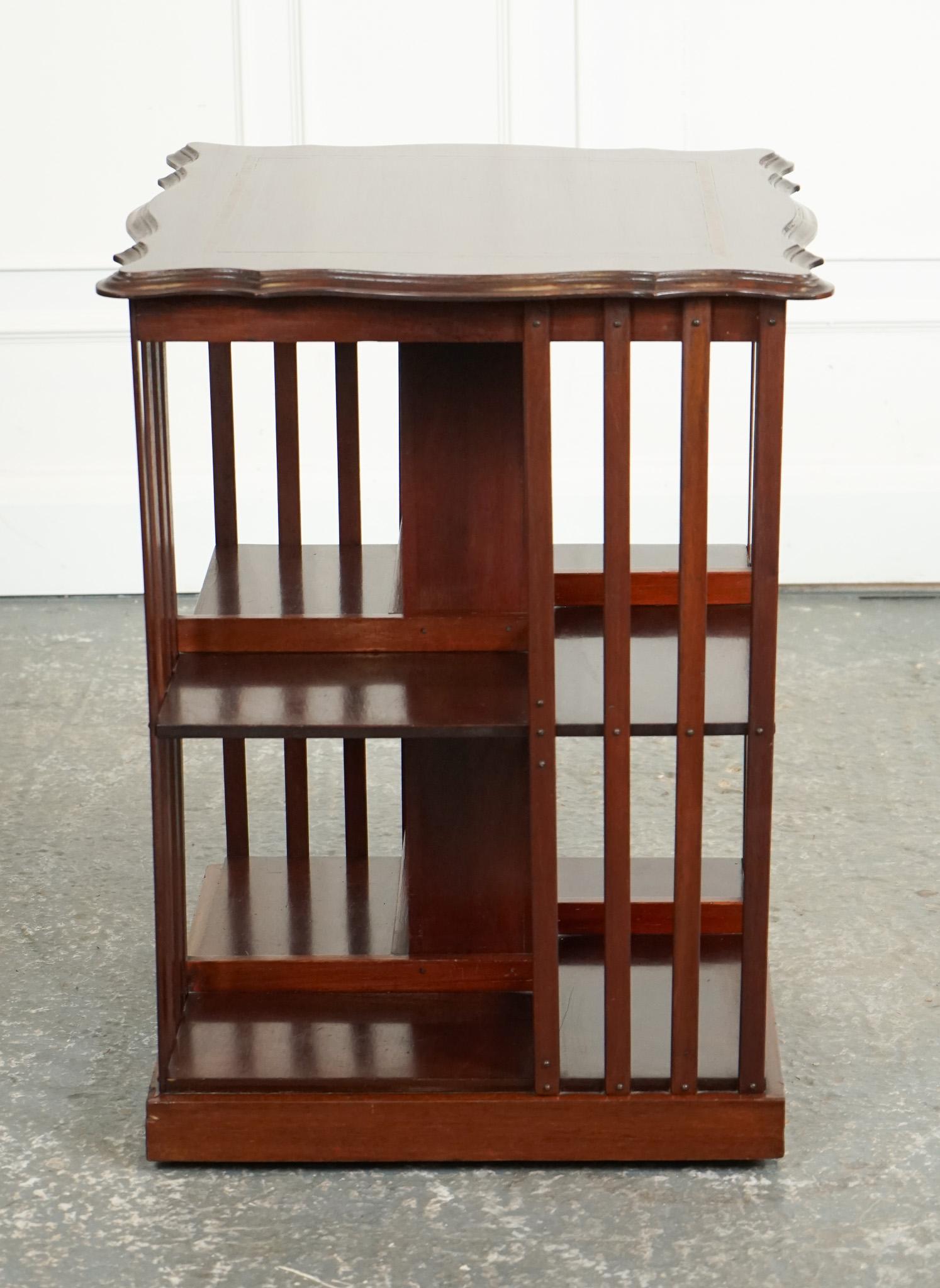 ANTIQUE EDWARDIAN REVOLVING BOOKCASE WITH A SERPENTiNE SHAPED TOP In Good Condition For Sale In Pulborough, GB