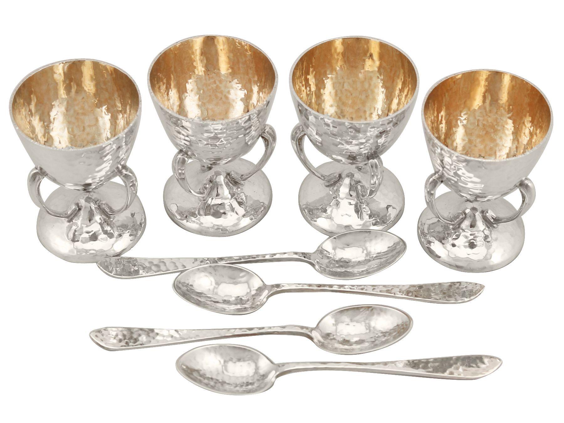 An exceptional, fine and impressive, set of four antique Edwardian Scottish sterling silver egg cups and spoons in the Art Nouveau style - boxed; part of our dining silverware collection

This exceptional antique Edwardian Scottish sterling silver